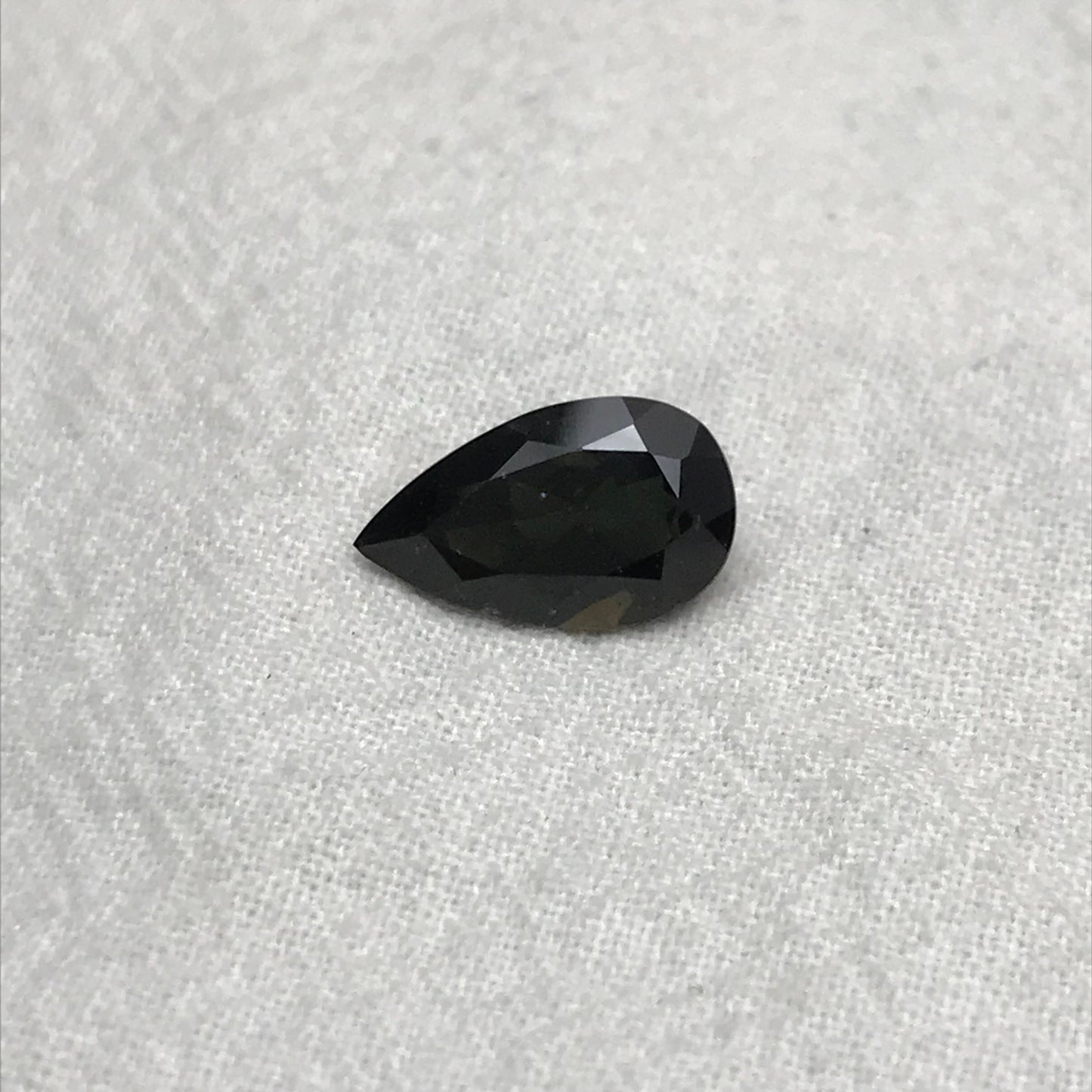 3.47 Carat Green Kornerupine 13.5x8mm Pear Cut, Faceted Green Gemstone, Deep Green