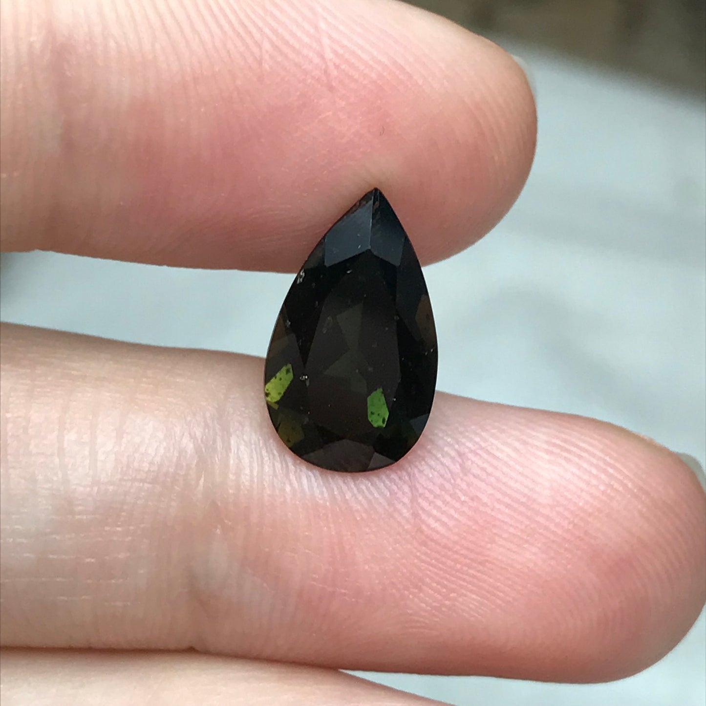 3.47 Carat Green Kornerupine 13.5x8mm Pear Cut, Faceted Green Gemstone, Deep Green
