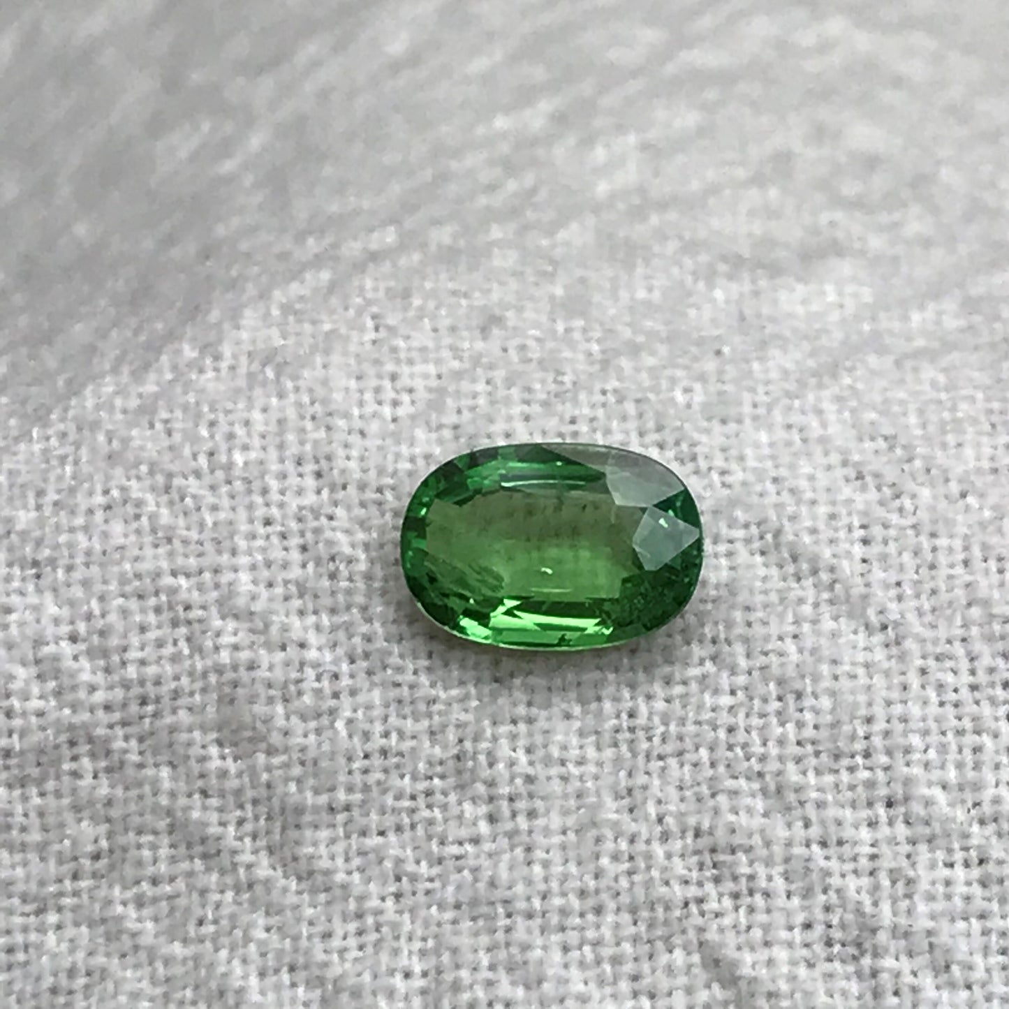 0.66 carat Natural Tsavorite Garnet 7x4.5mm Faceted Oval cut
