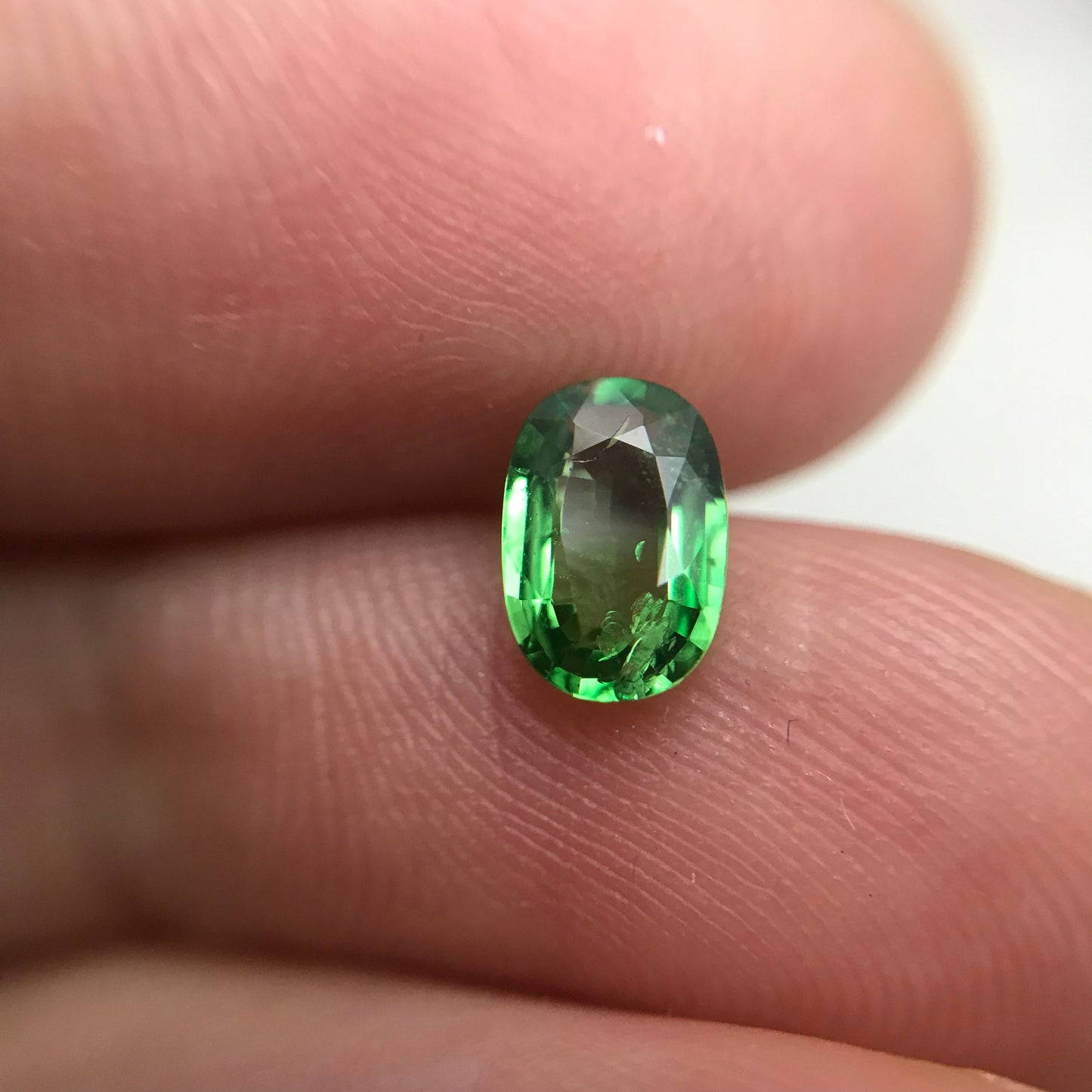0.66 carat Natural Tsavorite Garnet 7x4.5mm Faceted Oval cut