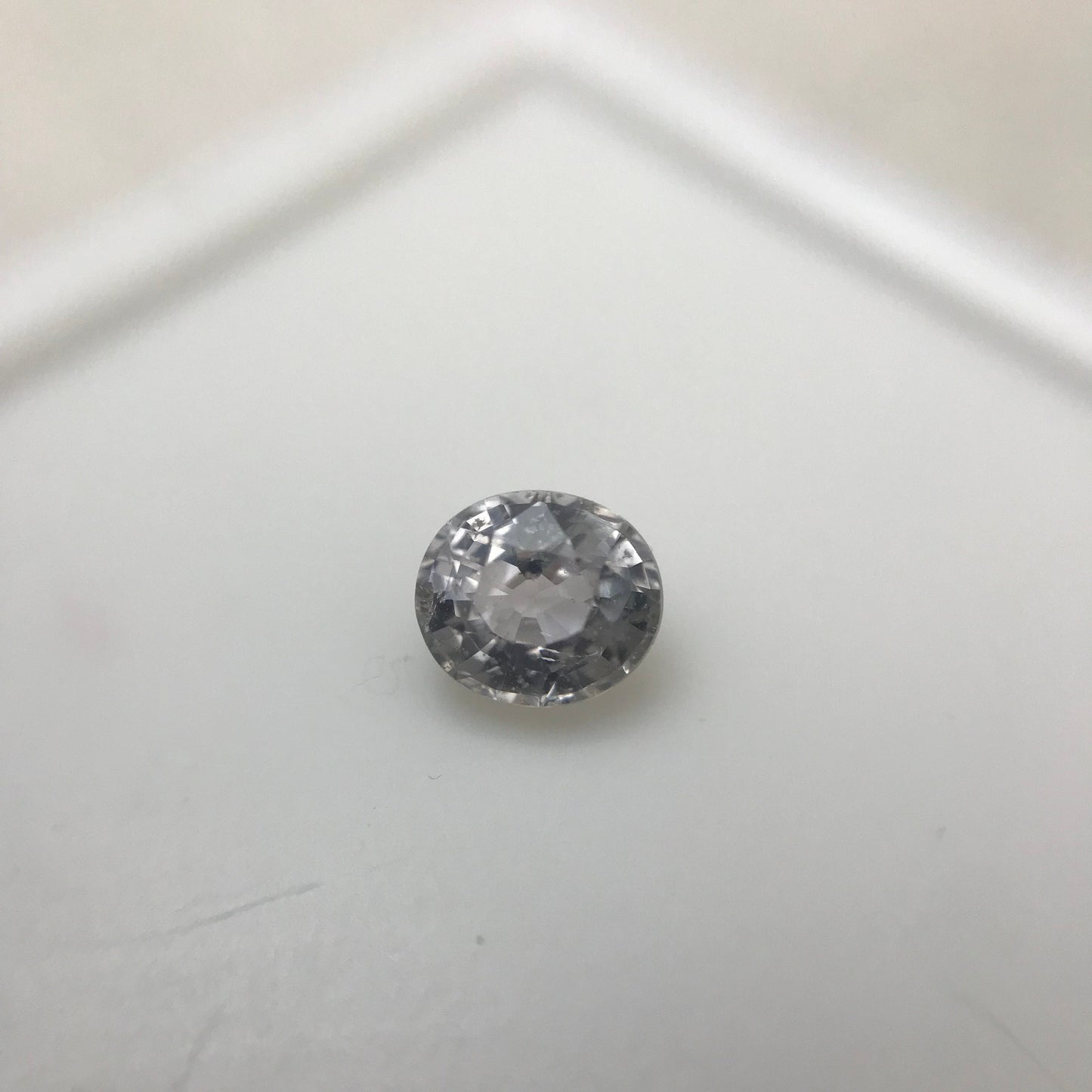 Faint Purple Natural Sapphire 0.85 carat 5.7x5mm Oval Cut, Faceted Loose Unheated Lightly Colored Silver Sapphire