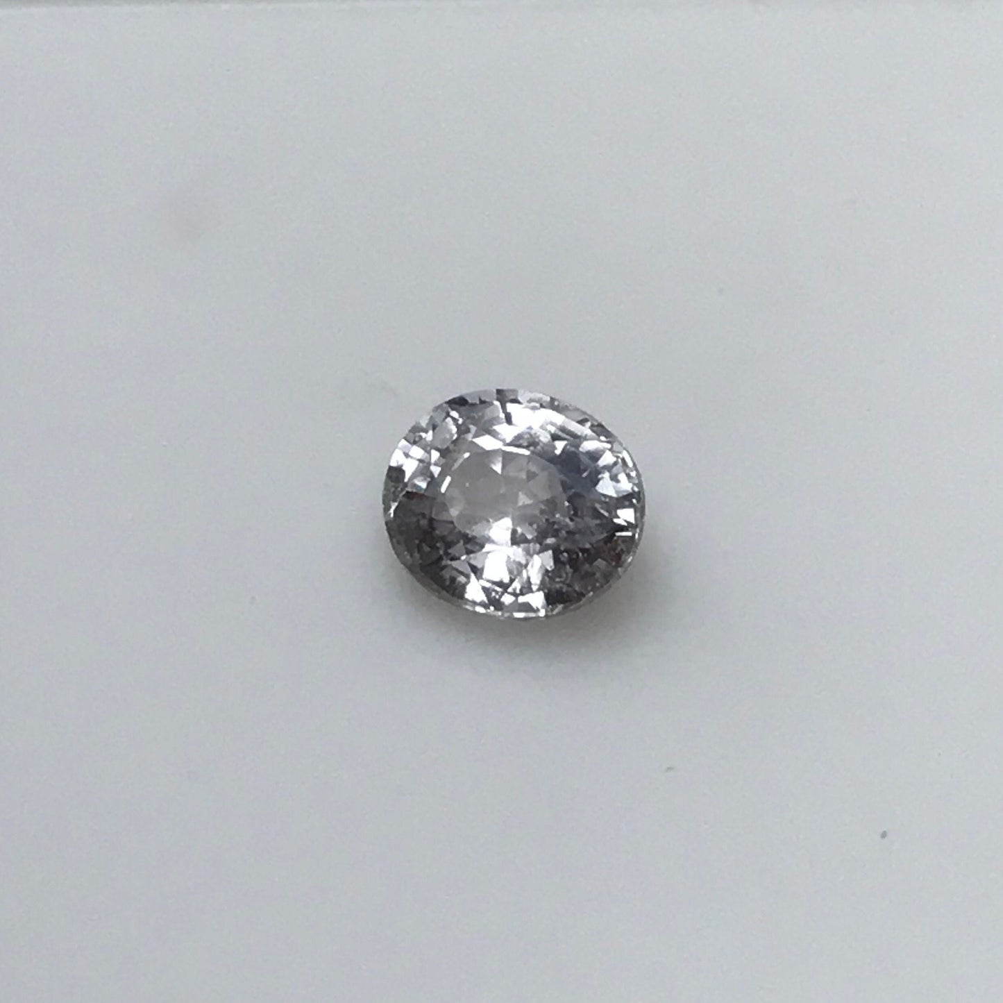Faint Purple Natural Sapphire 0.85 carat 5.7x5mm Oval Cut, Faceted Loose Unheated Lightly Colored Silver Sapphire