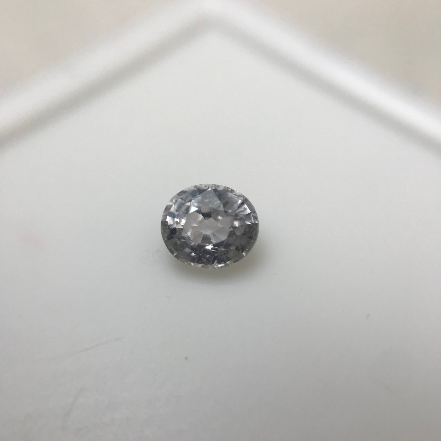 Faint Purple Natural Sapphire 0.85 carat 5.7x5mm Oval Cut, Faceted Loose Unheated Lightly Colored Silver Sapphire