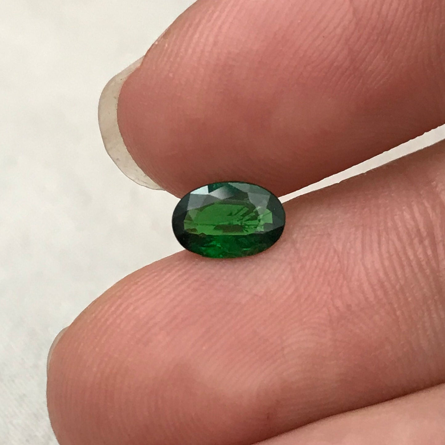 0.63 carat Natural Green Tsavorite Garnet 7x4.7mm Faceted Oval cut, Rich Emerald Green