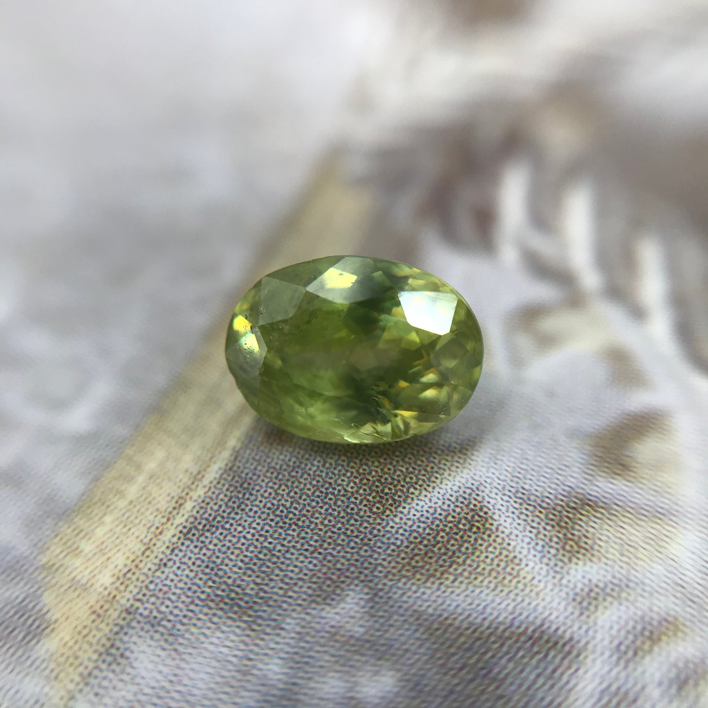 1.11 ct Yellowish Green Sphene 7x5mm Oval Cut, Natural Madagascar Sphene, Faceted Loose Titanite