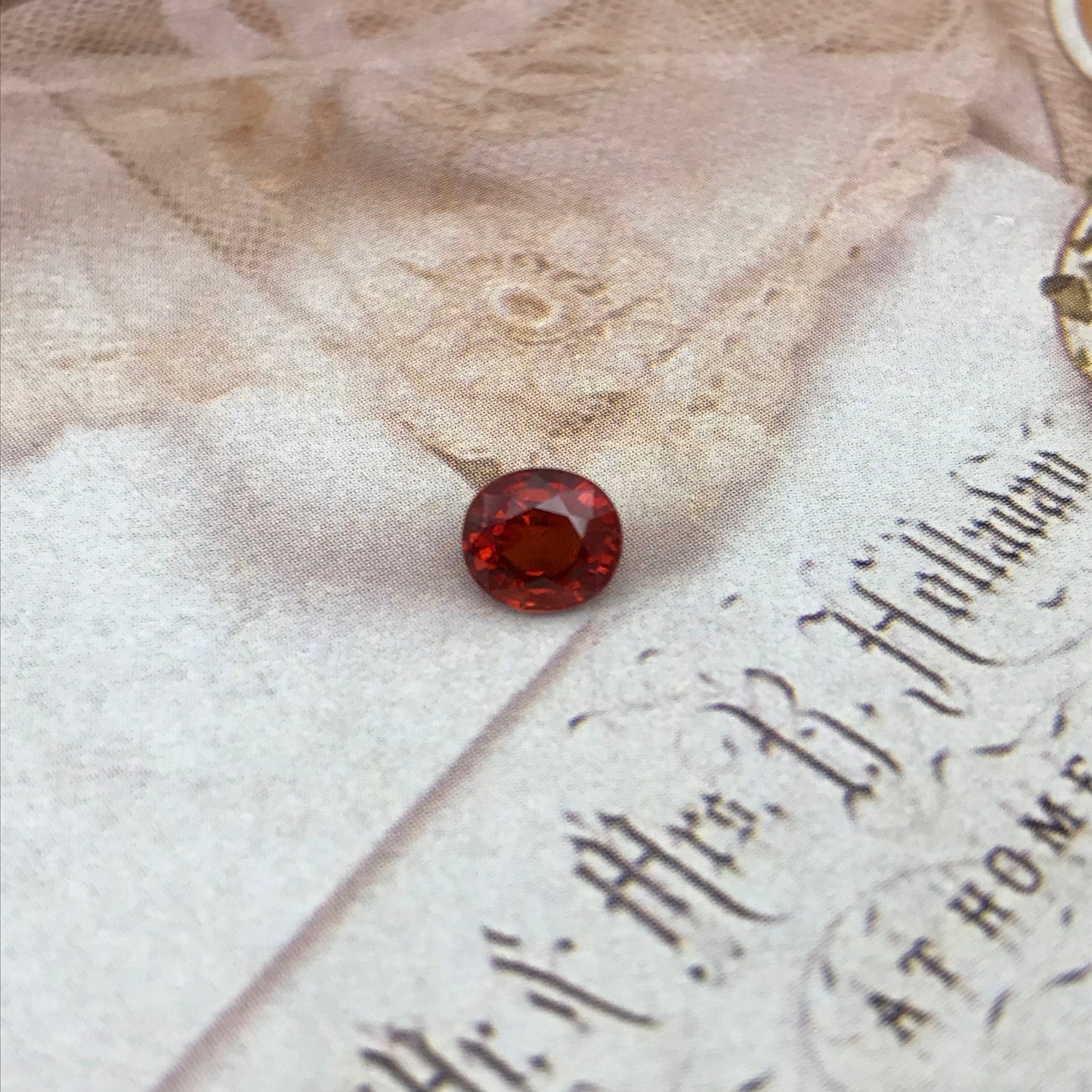 Natural Red Orange Spessartite Garnet 1.78 Carat 6.6 x 6 mm Oval Cut, Faceted Loose, Rich Red Orange Garnet