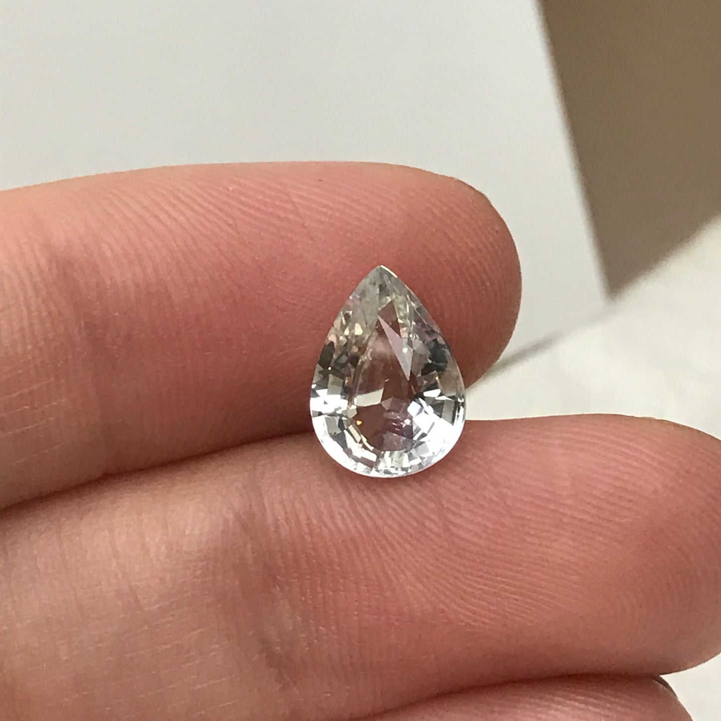 GIA Certified Light Sapphire 2.88 carat 10.5x7.7mm Pear Cut, Faceted Loose Unheated Nearly Colorless Sapphire