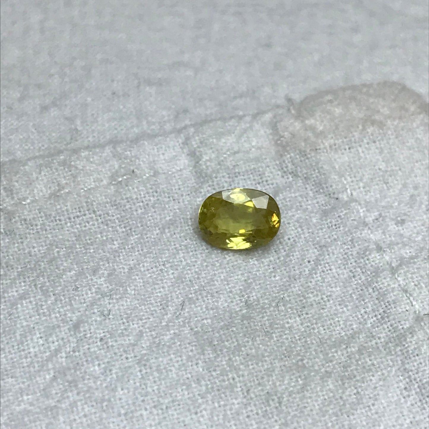 1.09 Ct. Yellow Sphene, 7.5x5.5 Oval Cut, Rainbow Fire, Natural Madagascar Sphene, Faceted Loose Titanite