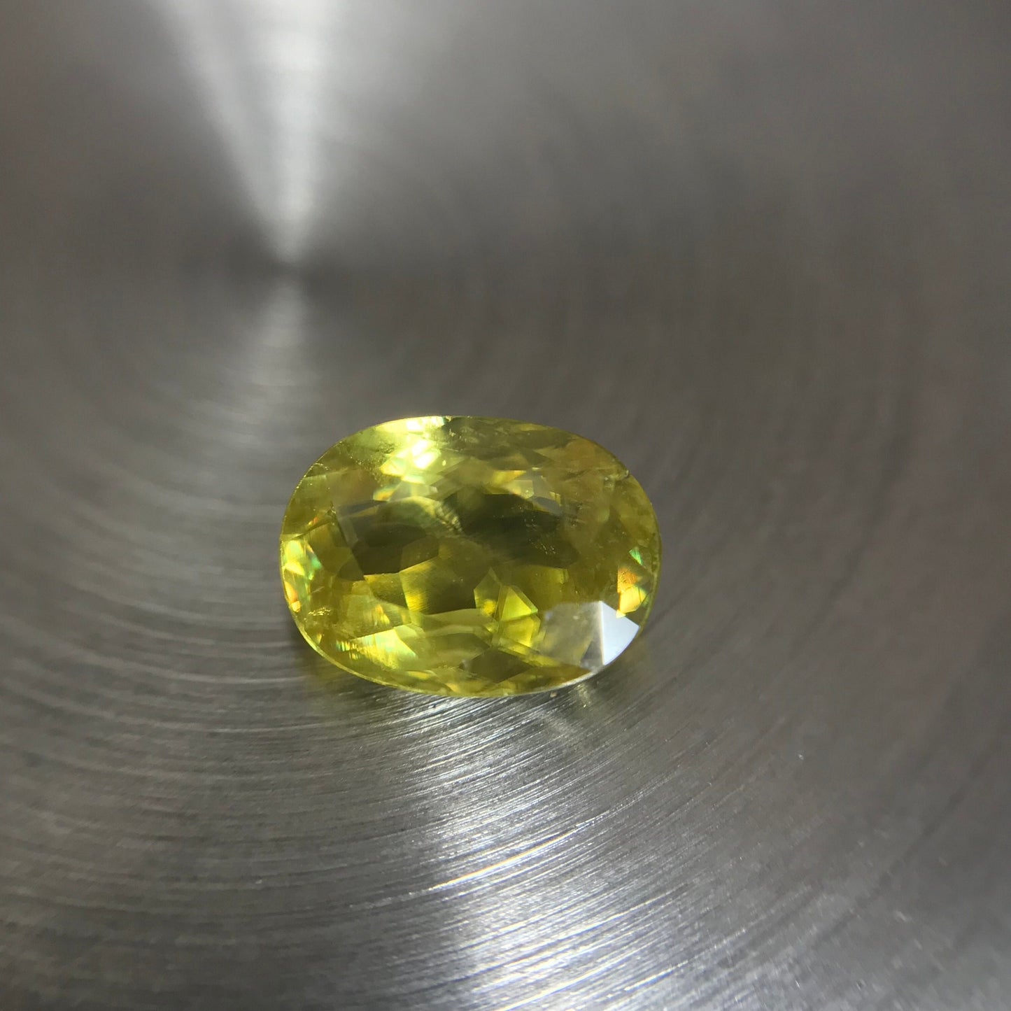 1.09 Ct. Yellow Sphene, 7.5x5.5 Oval Cut, Rainbow Fire, Natural Madagascar Sphene, Faceted Loose Titanite