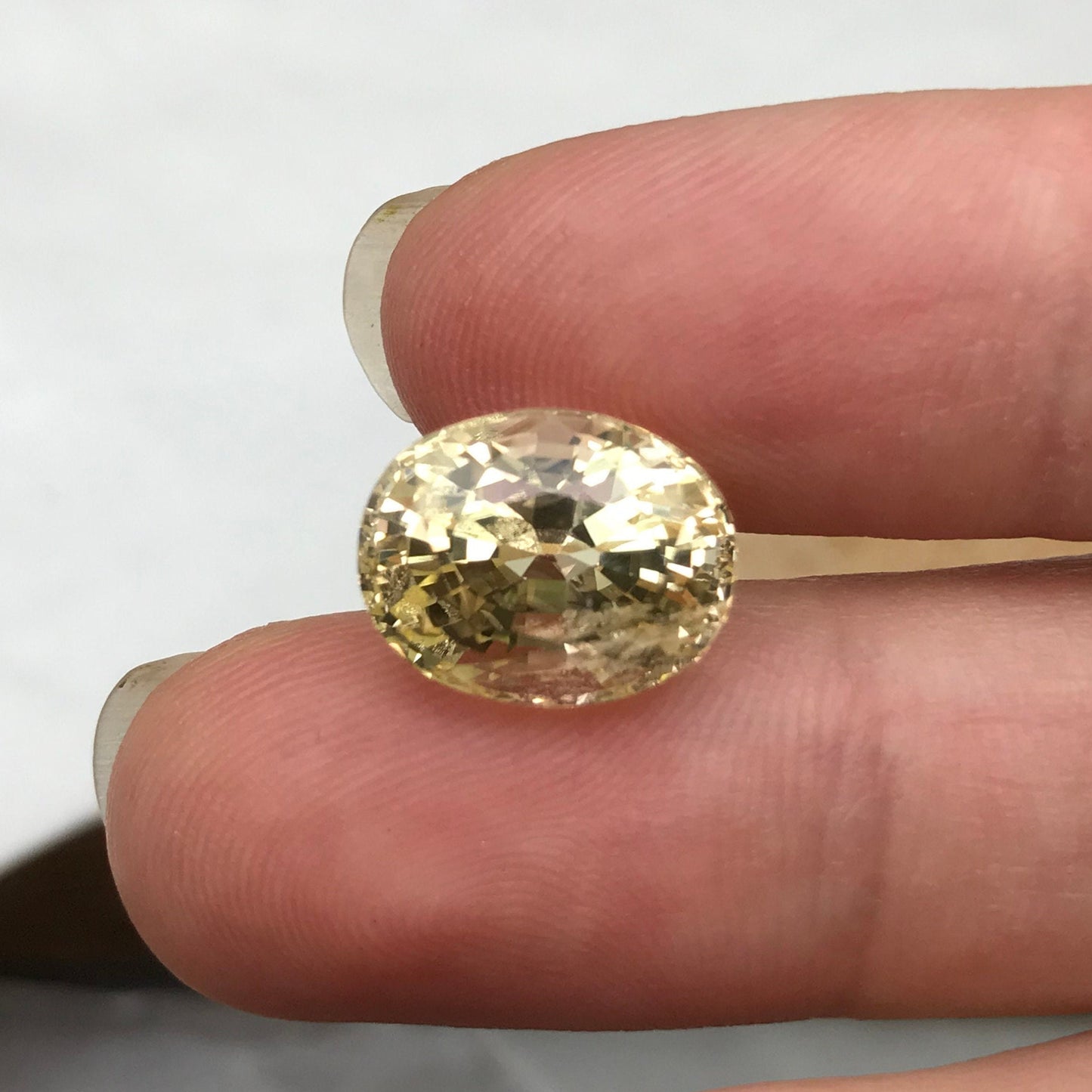 GIA Certified 10.14 Carat Unheated Yellow Sapphire 12.71x9.99mm Oval Cut, Faceted Loose Natural Sri Lanka Sapphire