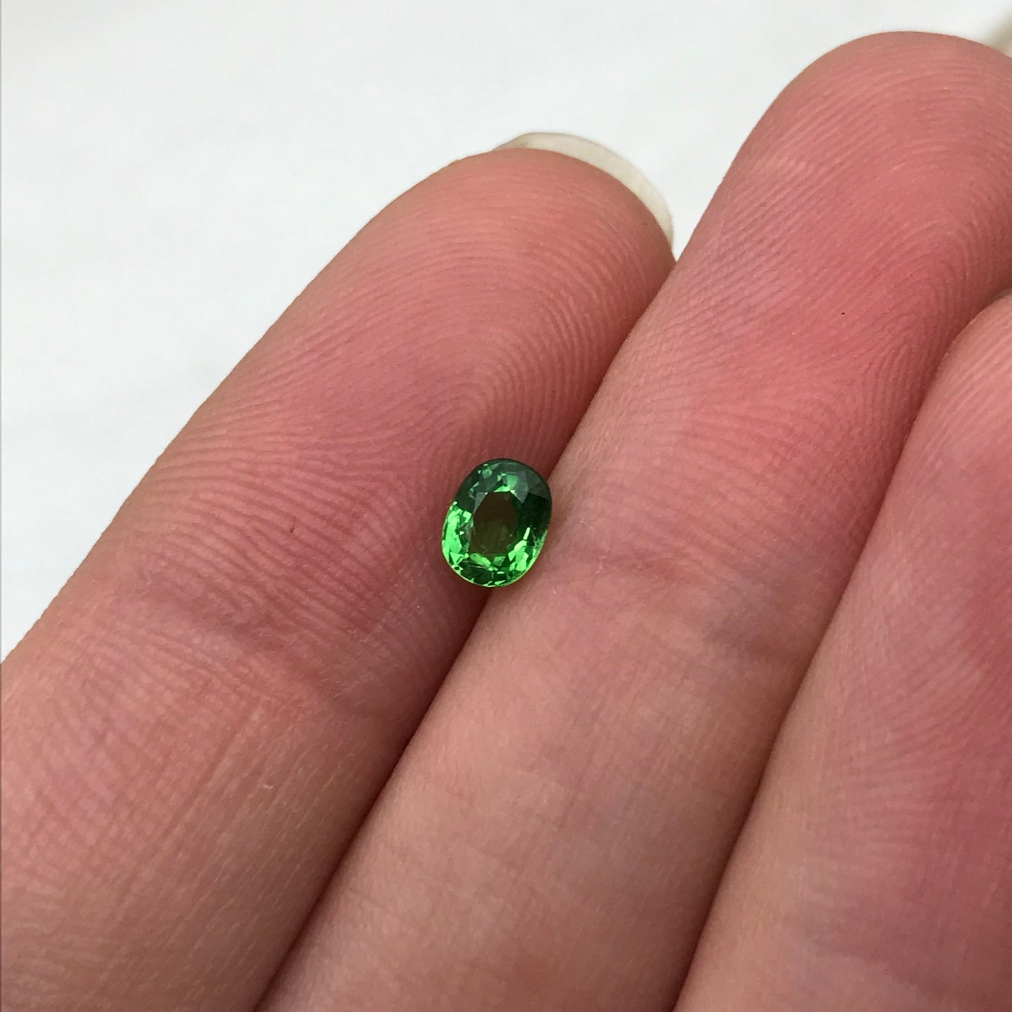 0.47 carat Natural Green Tsavorite Garnet 5.0x3.9mm Oval Cut, Faceted Loose Gemstone