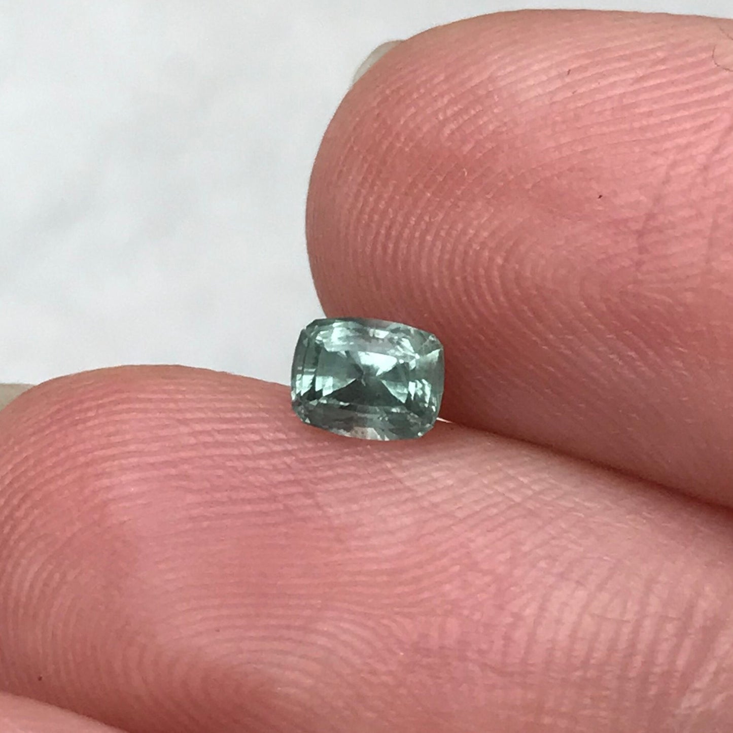 Bluish Green Montana Sapphire 0.69 carat, 4.7x3.7 mm Rectangular Cushion Cut, Unheated Faceted Loose Gemstone