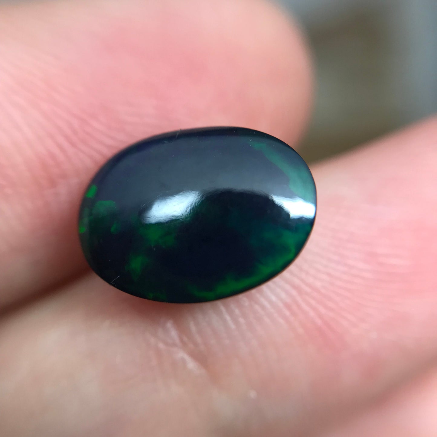 Black Opal 2.33 carat 11.8x8.7mm Oval Cabochon, Heat/Sugar  Enhanced Natural Opal