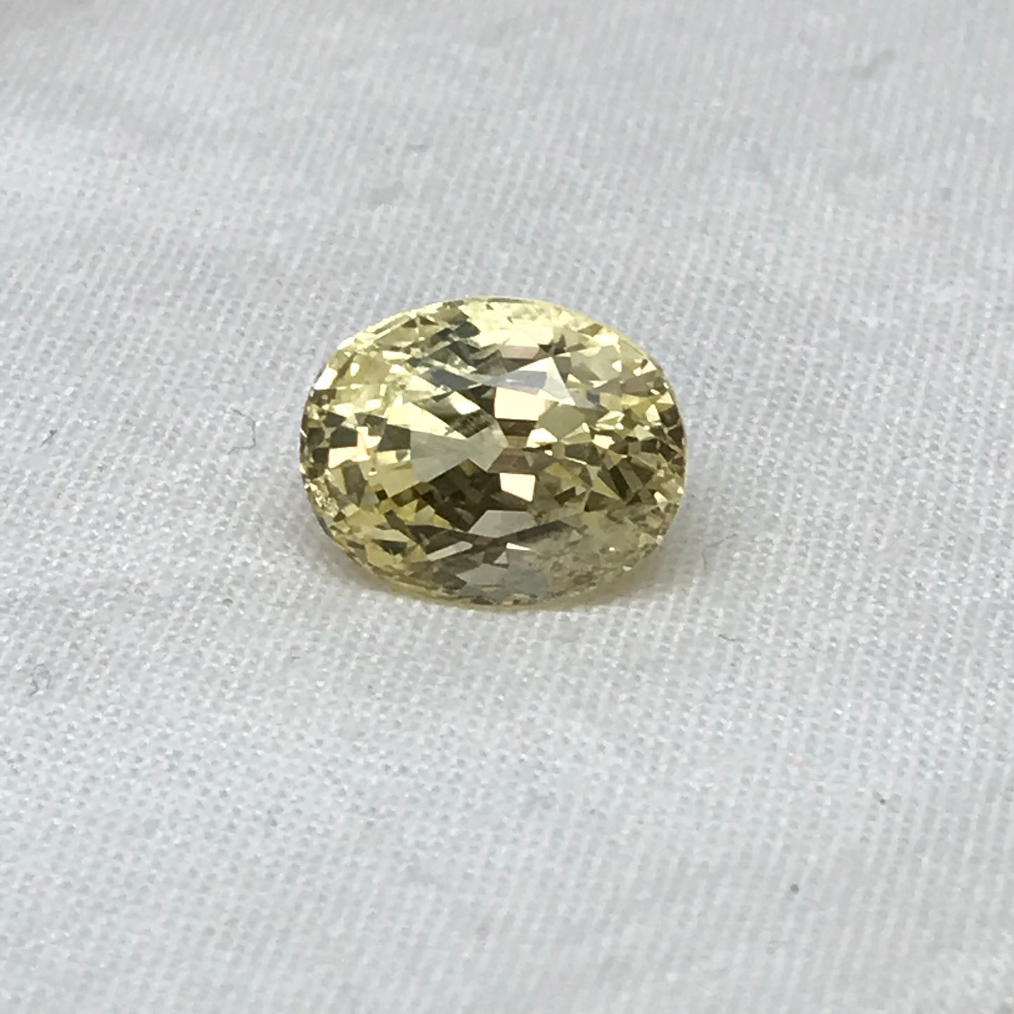 GIA Certified 10.14 Carat Unheated Yellow Sapphire 12.71x9.99mm Oval Cut, Faceted Loose Natural Sri Lanka Sapphire