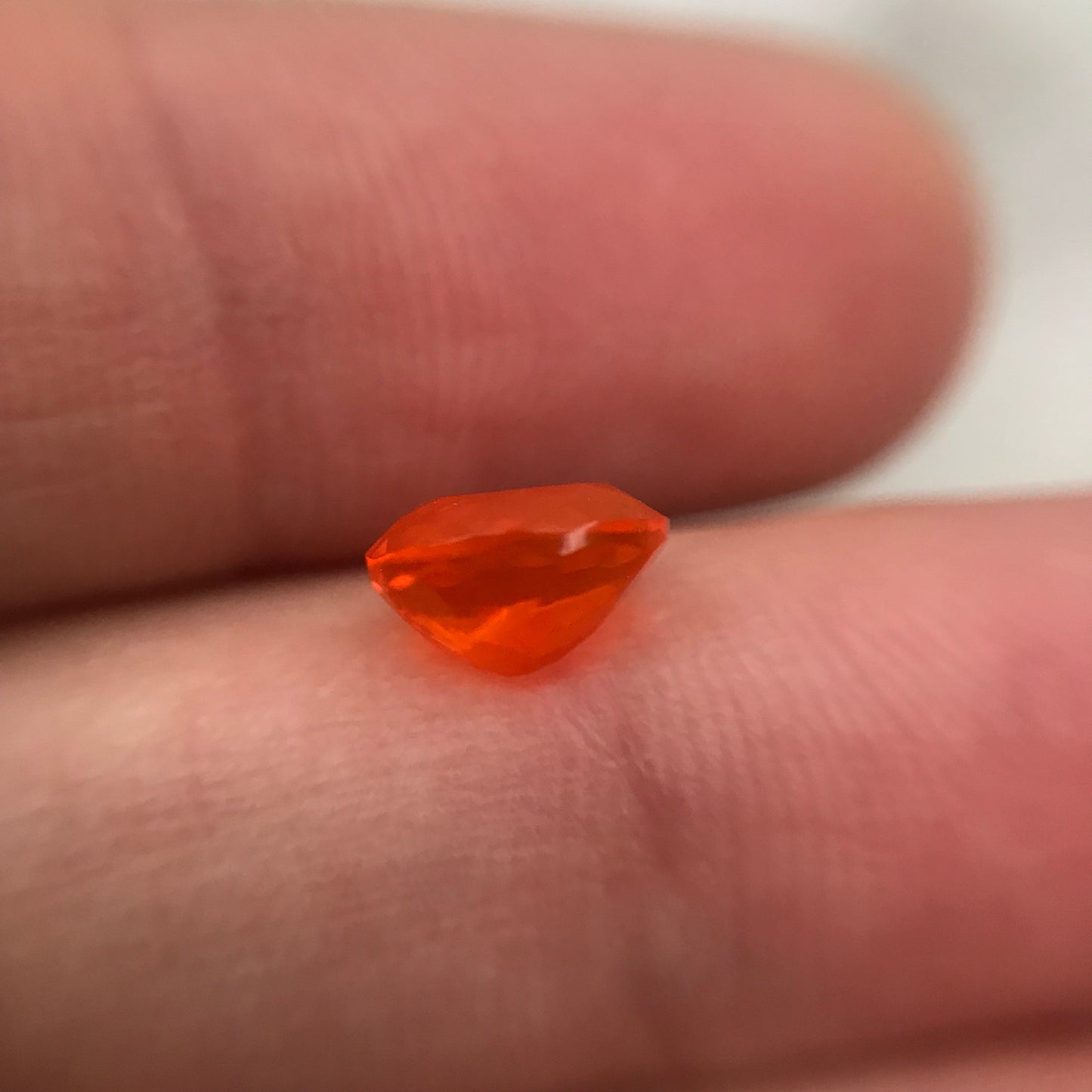 0.69 Carat Orange Mexican Fire Opal 7.4x6.0mm Oval Cut, Faceted Loose Opal