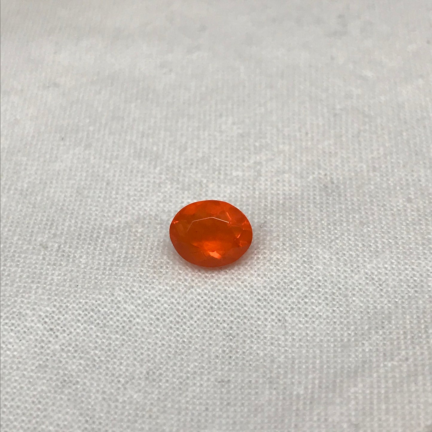 0.69 Carat Orange Mexican Fire Opal 7.4x6.0mm Oval Cut, Faceted Loose Opal