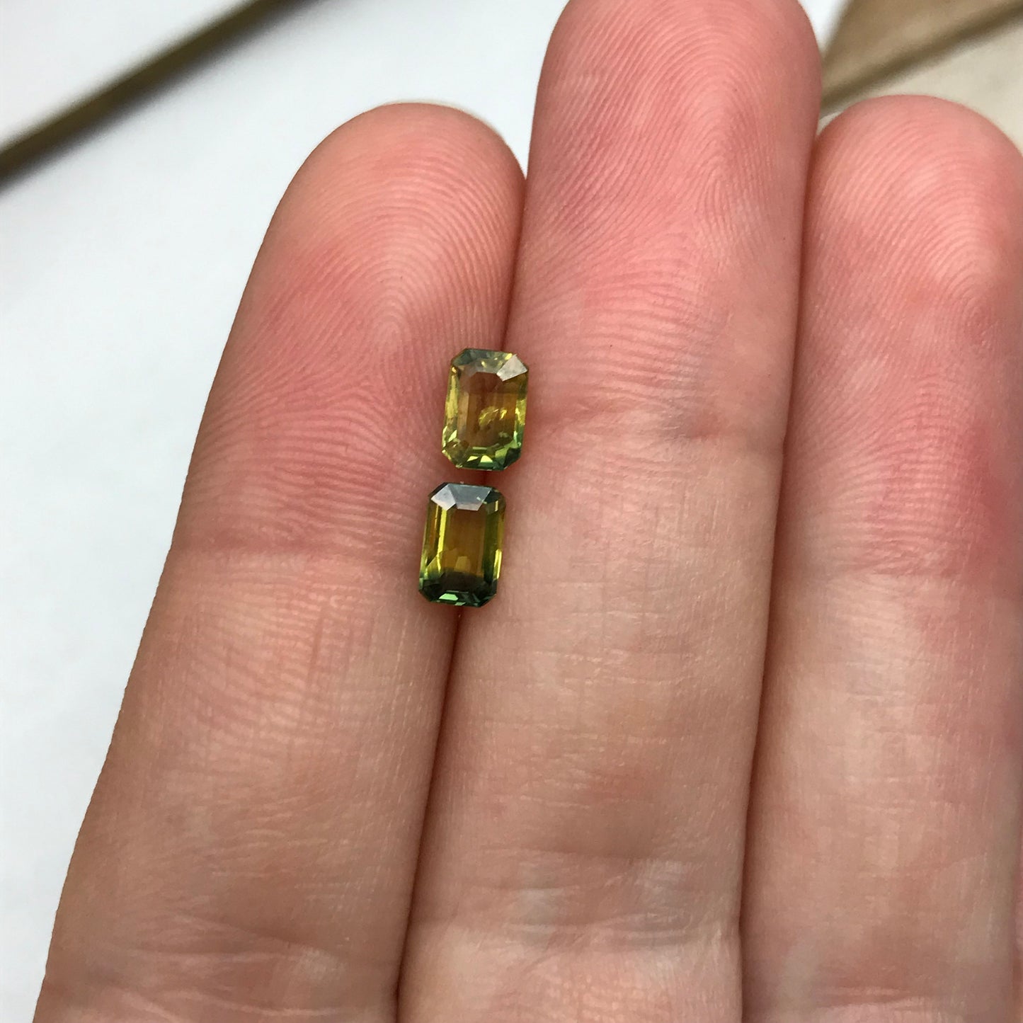 2 Natural Bi-Color Sapphires 6x4mm Yellow Green Sapphires, 0.72 ea. Pair of Emerald cut Sapphires, 1.47 CTW,