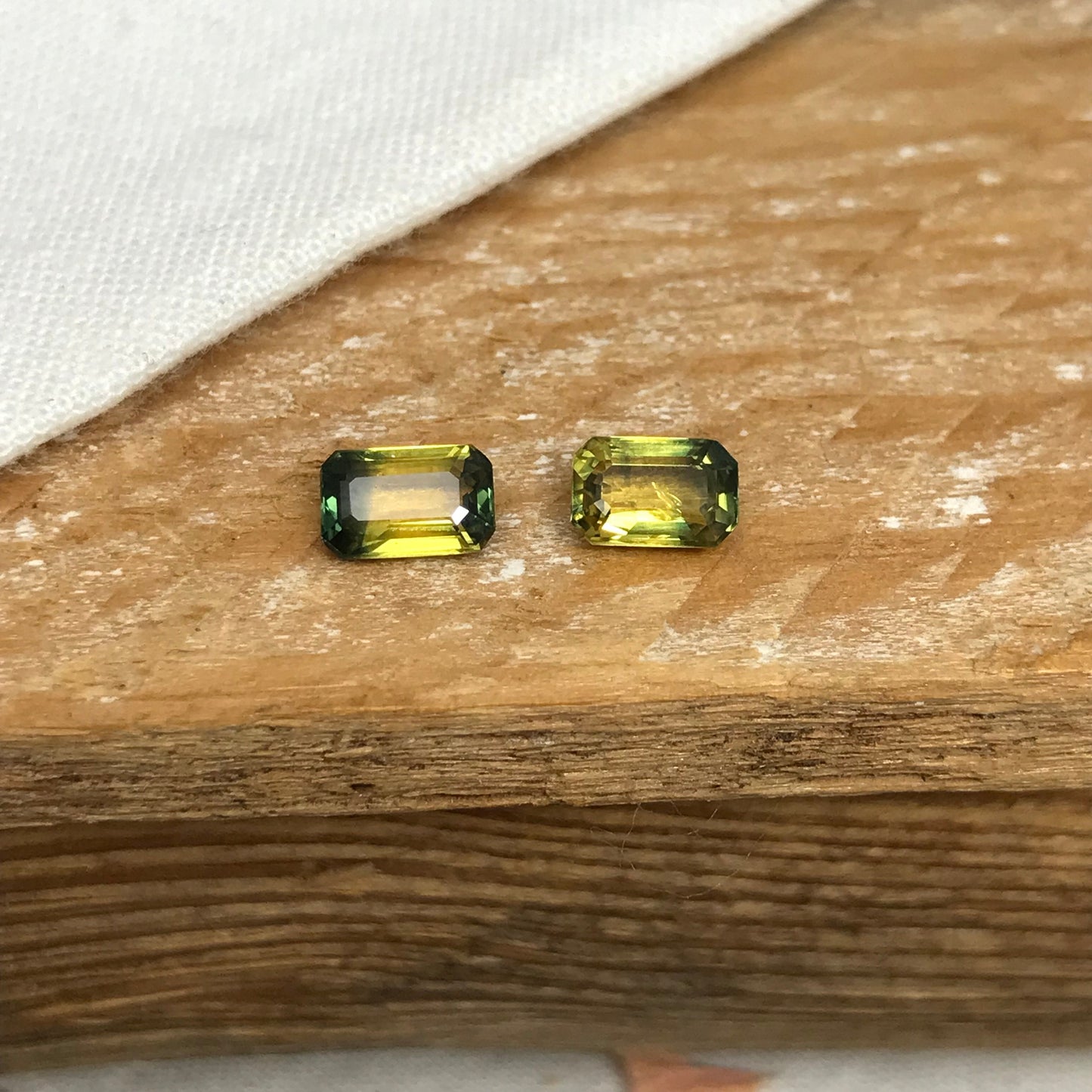 2 Natural Bi-Color Sapphires 6x4mm Yellow Green Sapphires, 0.72 ea. Pair of Emerald cut Sapphires, 1.47 CTW,
