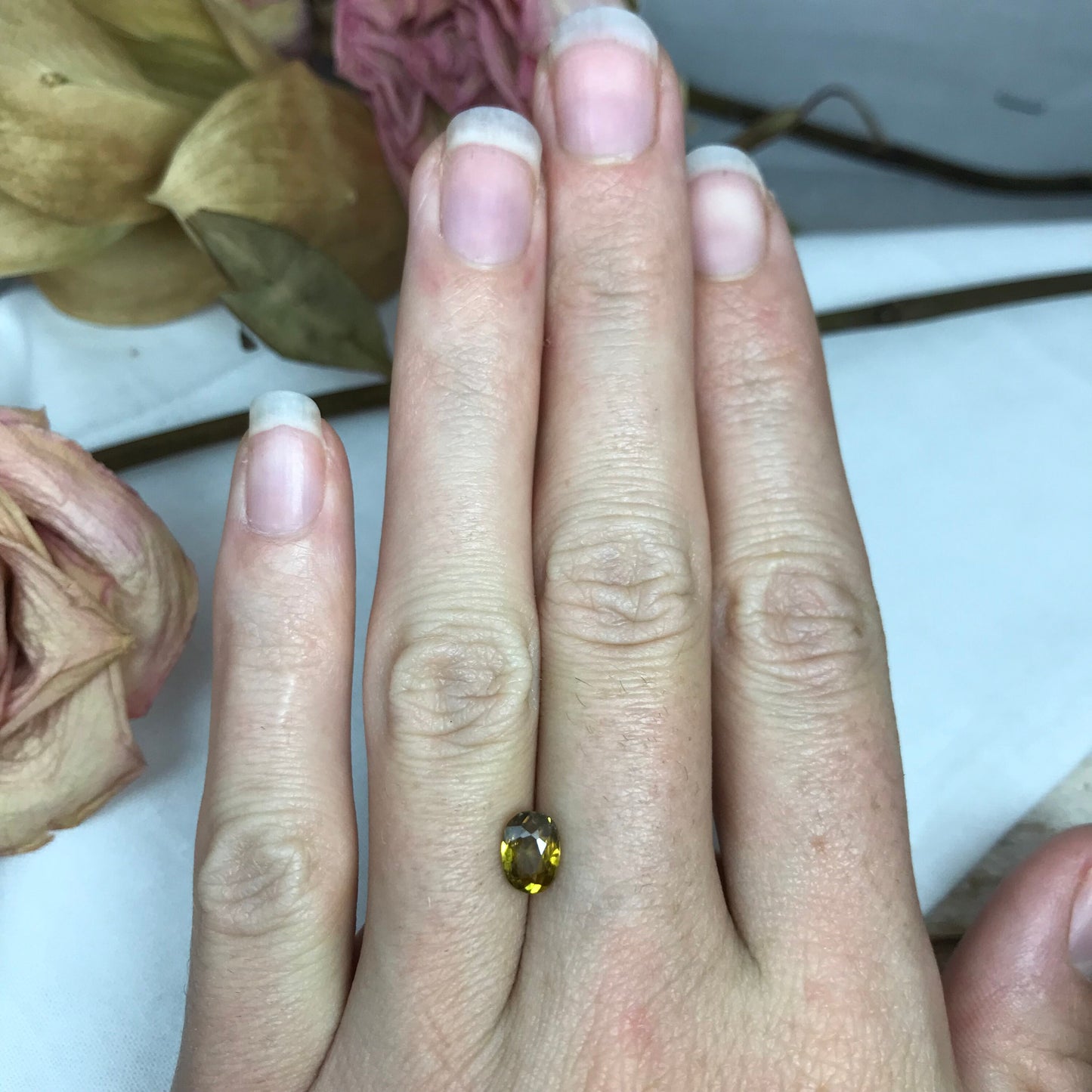 7x5mm Yellow Sphene Oval Cut, 0.84 Carat Natural Orangish Yellow Sphene with Rainbow Flashes