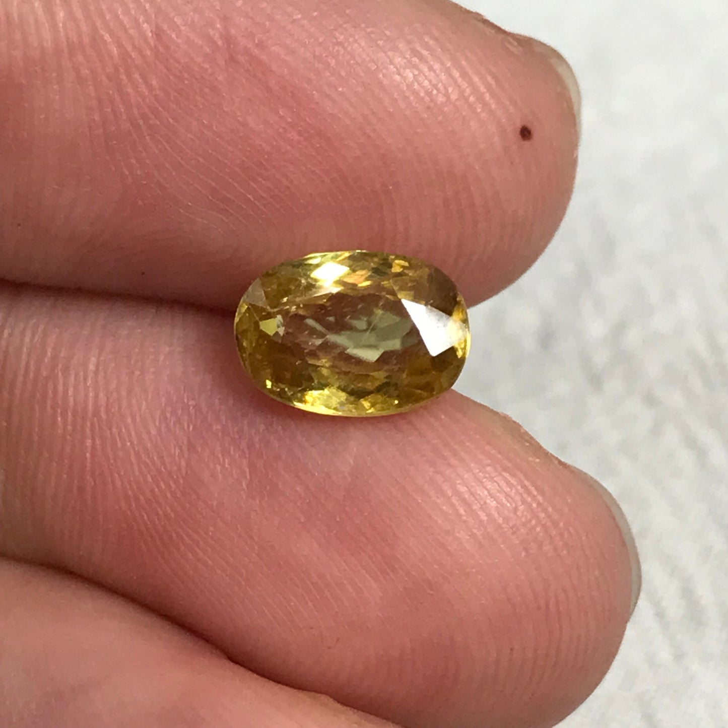 Yellow Sphene 1.53 Carat 8.5x6mm Oval Cut, Natural loose Gemstone