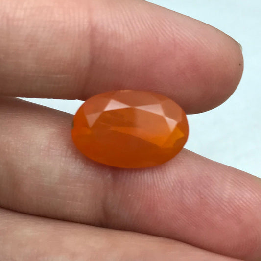 4.77 Carat Orange Mexican Fire Opal 15.78x10.52mm Oval Cut, Faceted Loose Opal