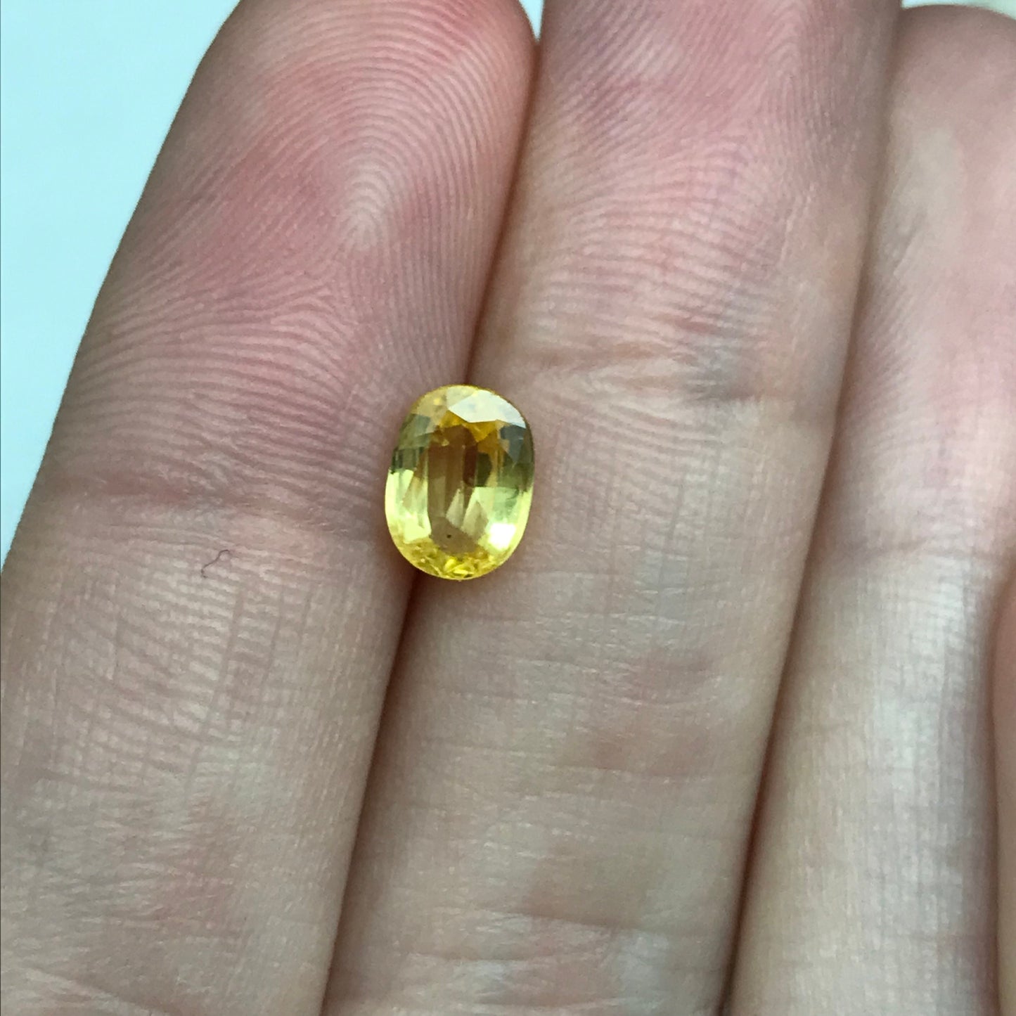 Natural Yellow Sapphire 1.34 Carat 7.5x5.5mm Oval Cut, Color Treated Gemstone, Earth Mined, BE Heat
