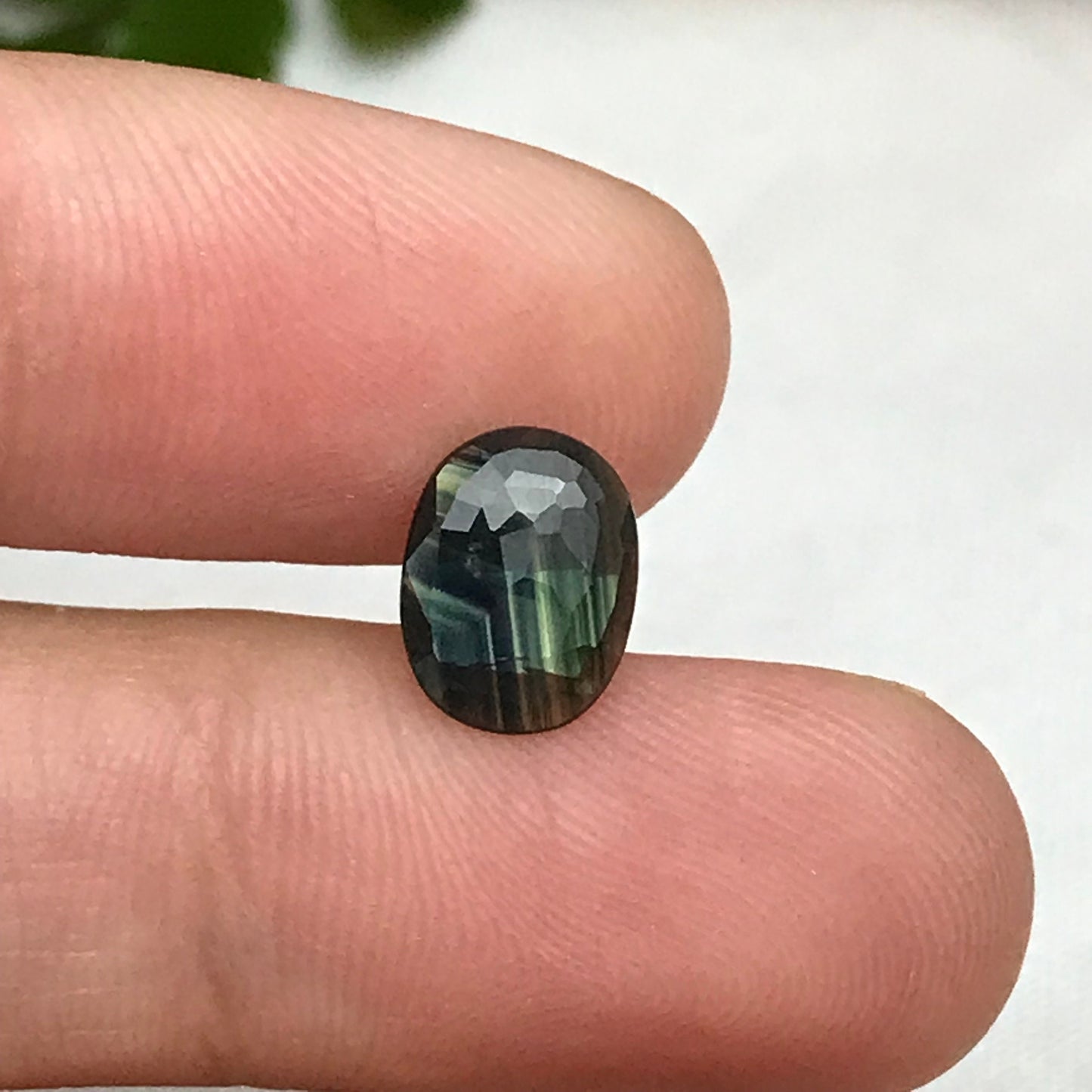 Blue Sapphire with Green Color Zoning 9.5x7.3mm Oval Cut, 1.69 Carat Faceted Loose Natural Shallow cut Sapphire