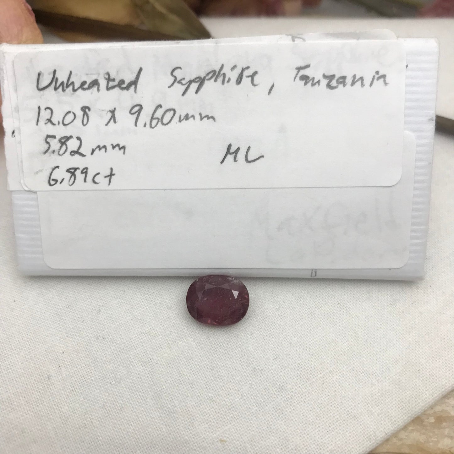 6.89 Carat Purplish Pink Sapphire 12.08x9.6mm Oval Cut, Faceted Loose Natural Tanzania Sapphire
