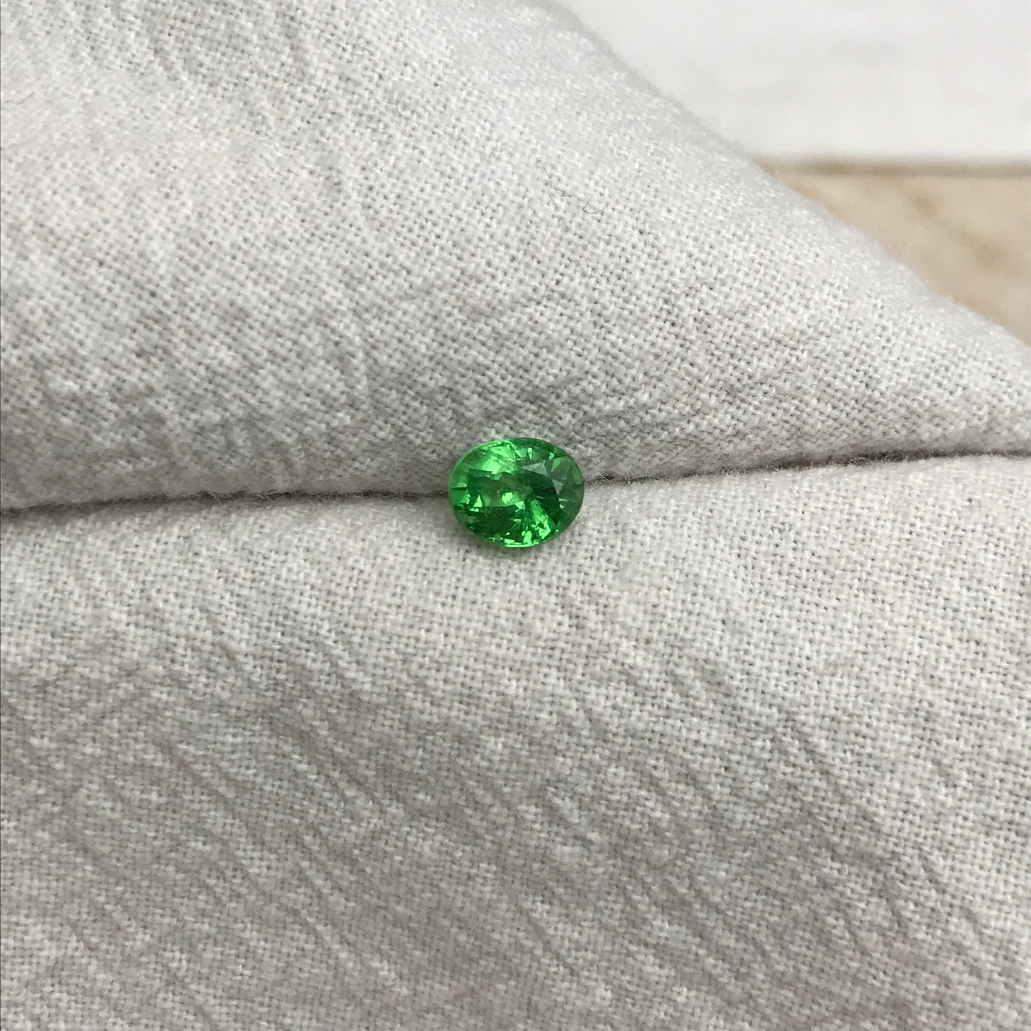0.76 Carat Green Tsavorite Garnet 5.78x4.63mm Oval Cut, Faceted Loose Gemstone