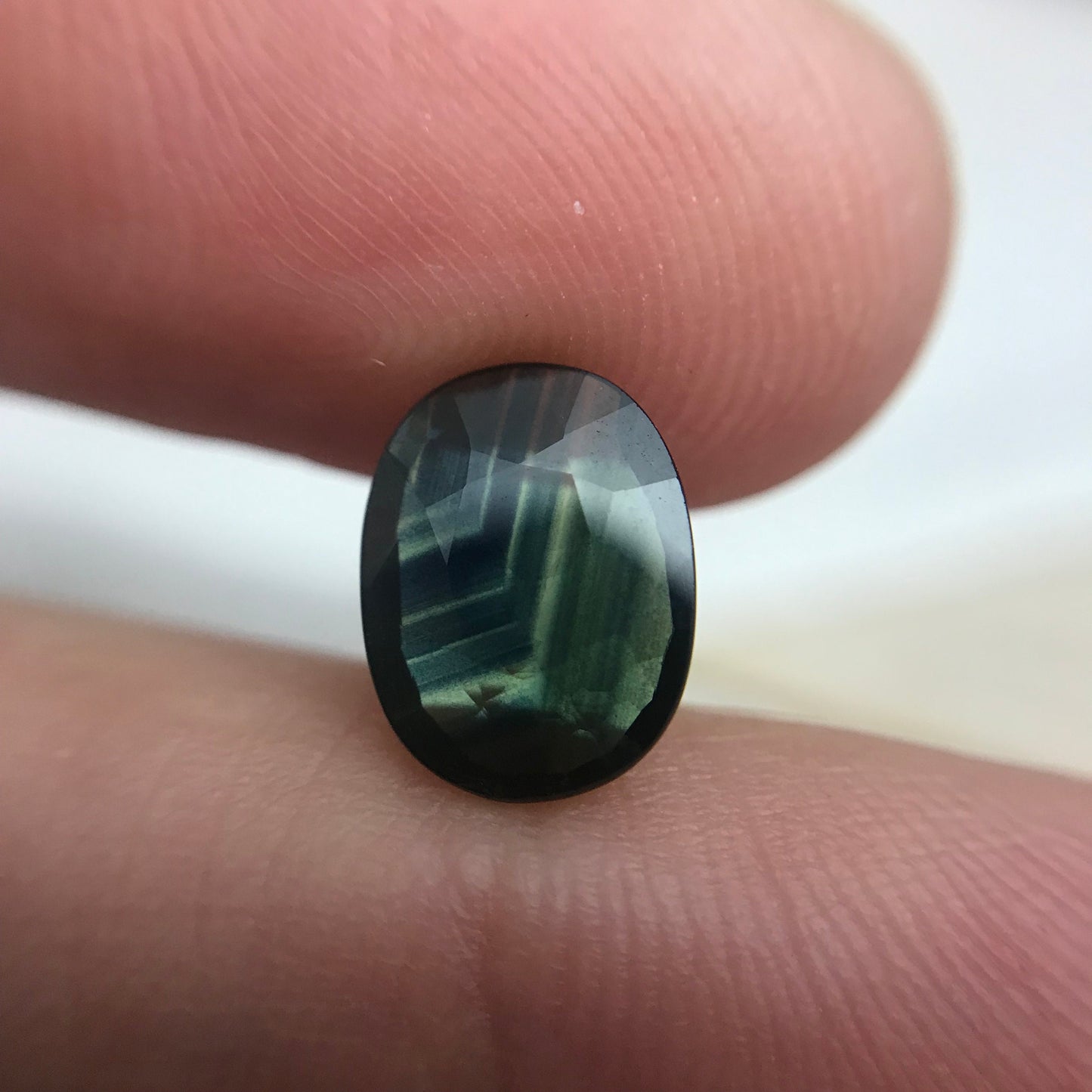Blue Sapphire with Green Color Zoning 9.5x7.3mm Oval Cut, 1.69 Carat Faceted Loose Natural Shallow cut Sapphire
