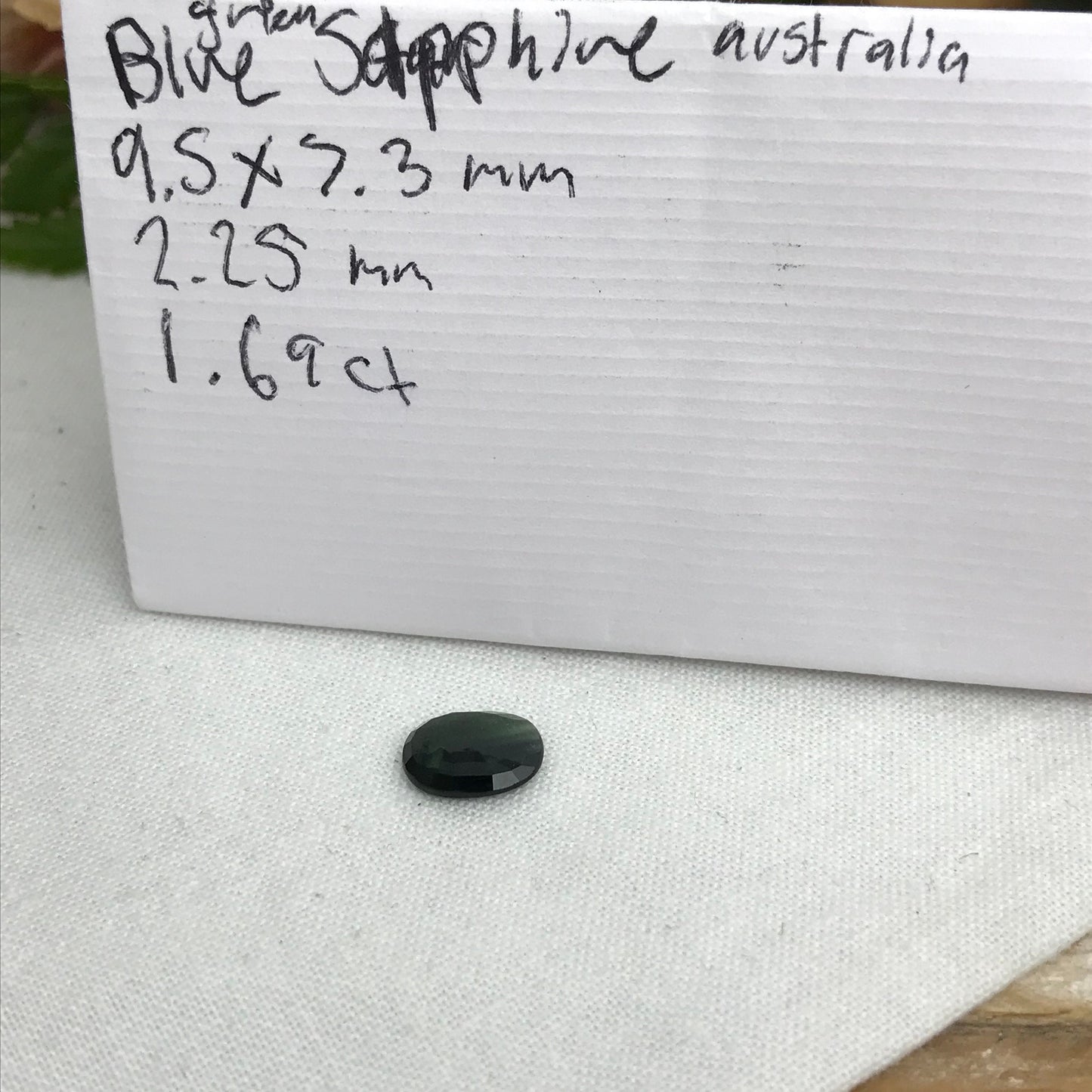 Blue Sapphire with Green Color Zoning 9.5x7.3mm Oval Cut, 1.69 Carat Faceted Loose Natural Shallow cut Sapphire