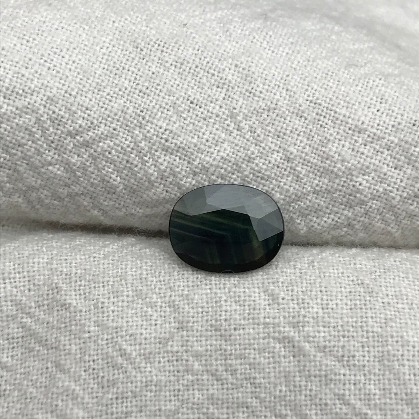Blue Sapphire with Green Color Zoning 9.5x7.3mm Oval Cut, 1.69 Carat Faceted Loose Natural Shallow cut Sapphire