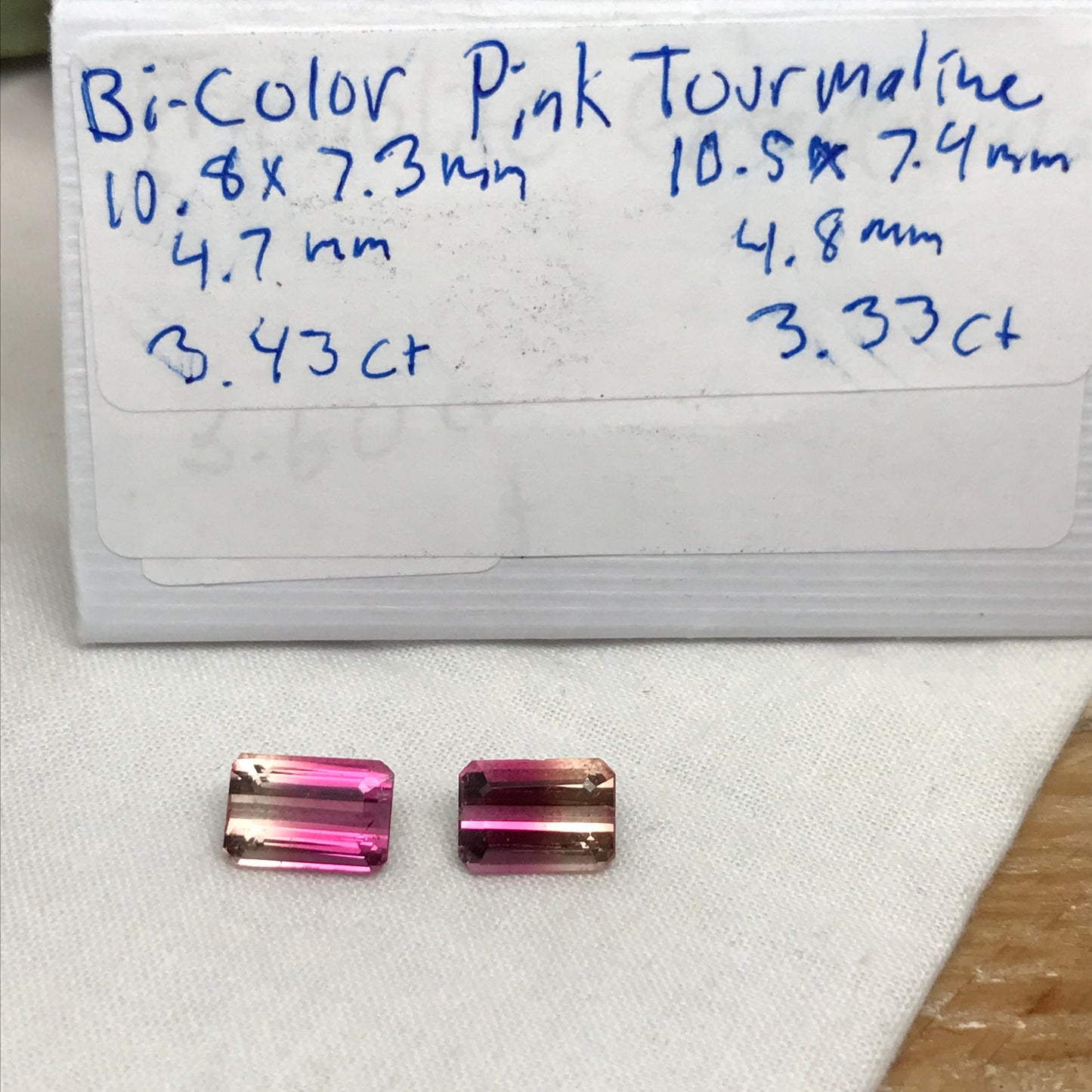 Pair of Natural Bi-Color Pink Tourmaline 6.76TCW Emerald cut Pink and Yellow Tourmaline Approx. 10.6x7.4mm