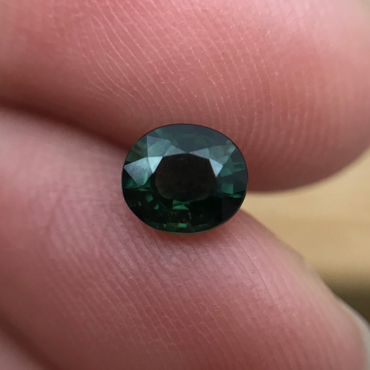 0.87 carat Natural Green Sapphire 5.8x5.1 Oval, Approx. 6x5mm