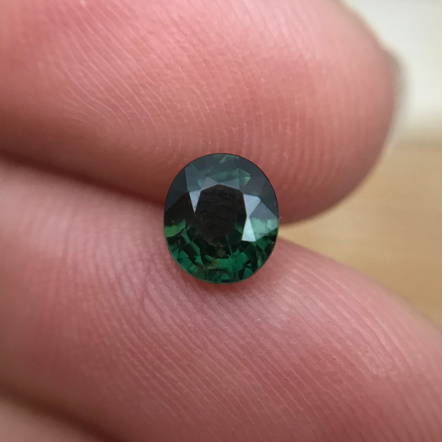 0.87 carat Natural Green Sapphire 5.8x5.1 Oval, Approx. 6x5mm