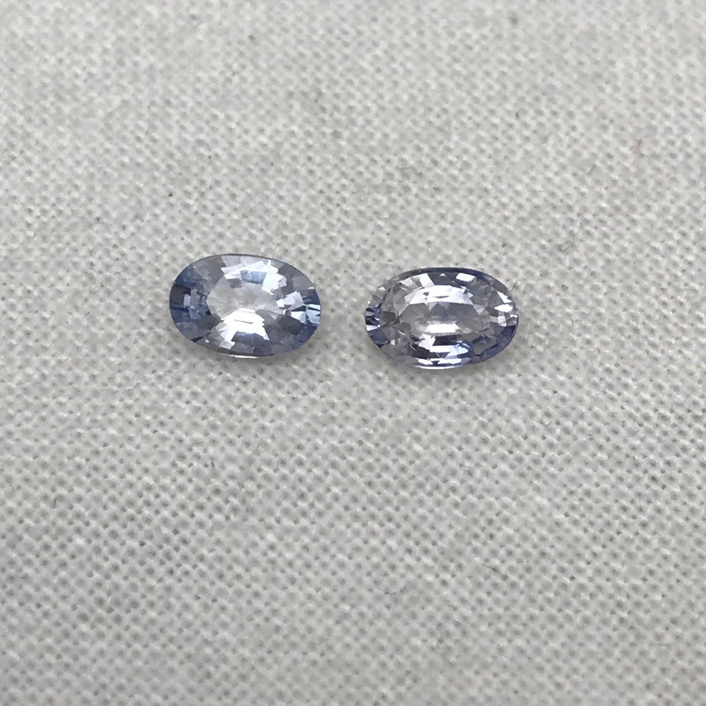 2 Natural Blue Sapphires 0.79 carats total, Loose Faceted Pair of Light Blue Sapphires, Oval Cut, 5.4x3.55mm Matching