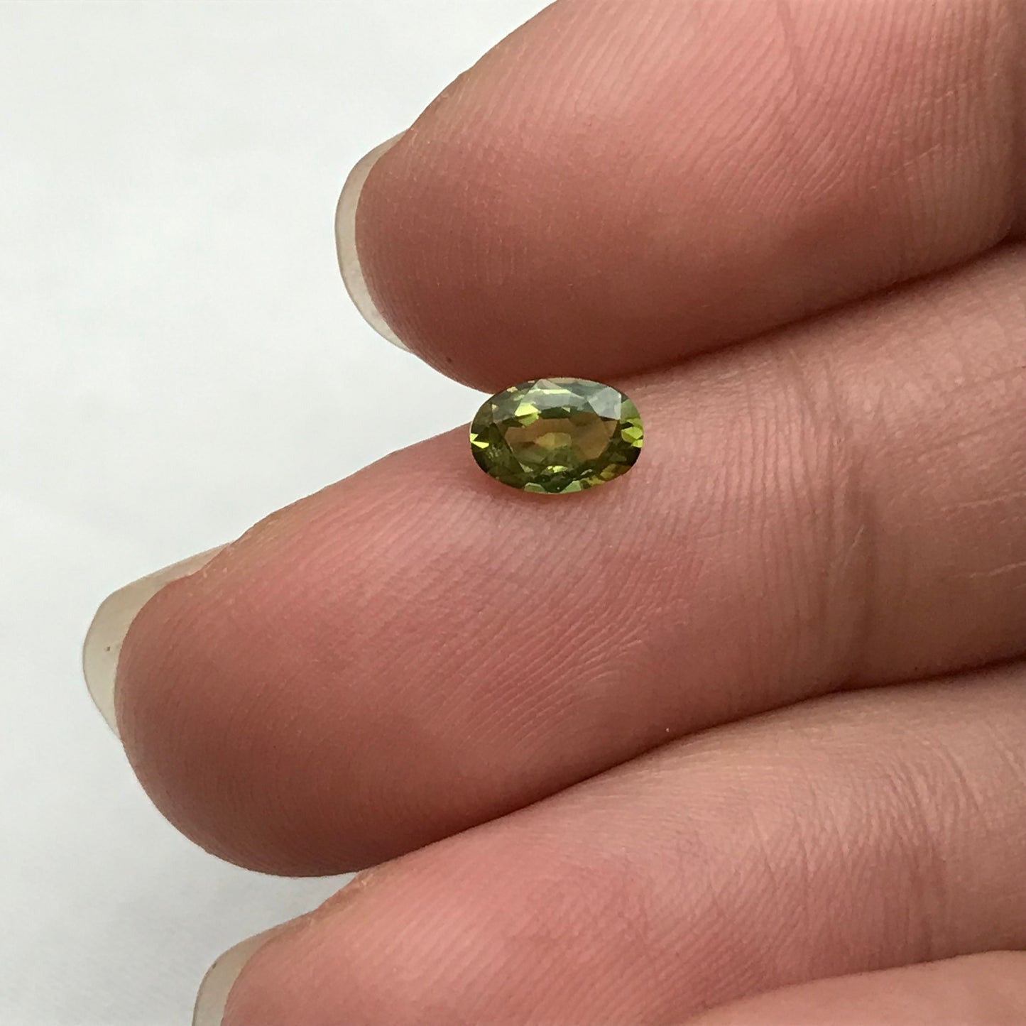Greenish Yellow Sapphire 6x4mm, Color-Treated Yellow Green 0.53  Ct, Oval cut, BE Treated Natural Sapphire