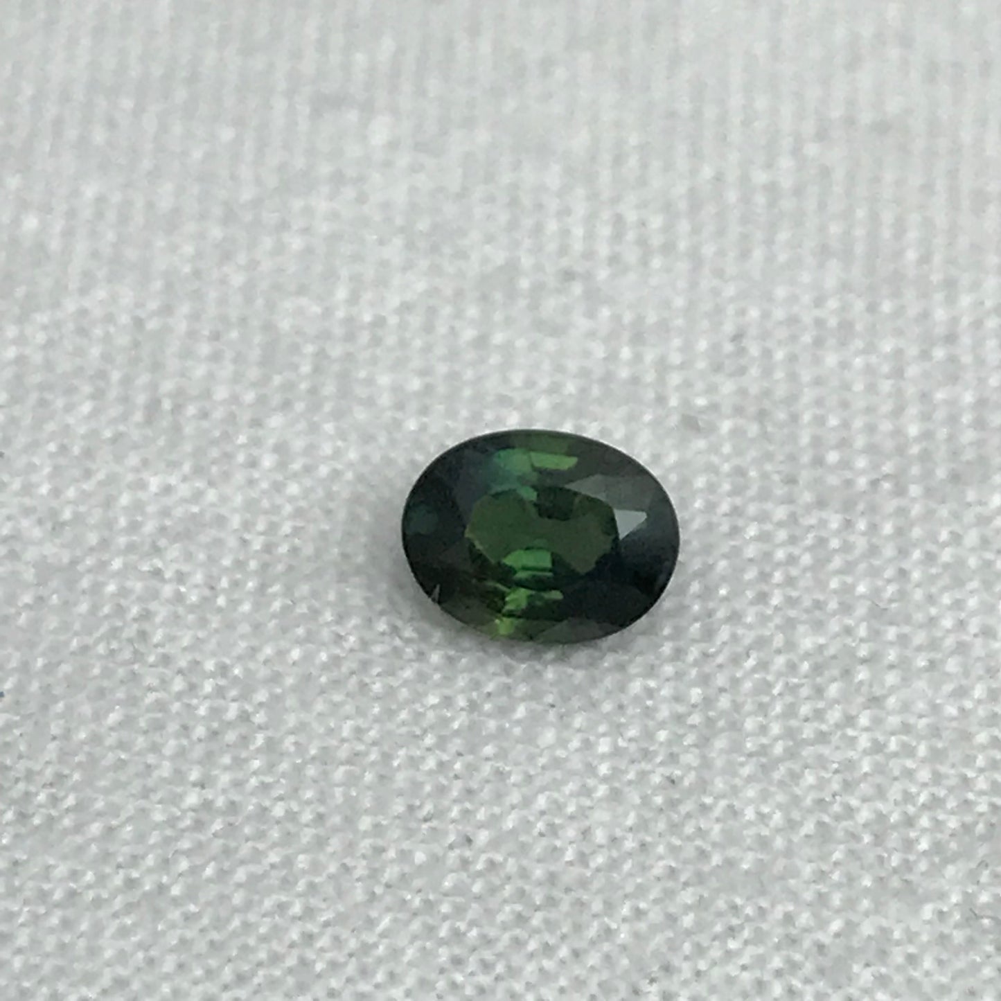 0.67 carat Natural Green Sapphire Oval Approx. 5x4.5mm