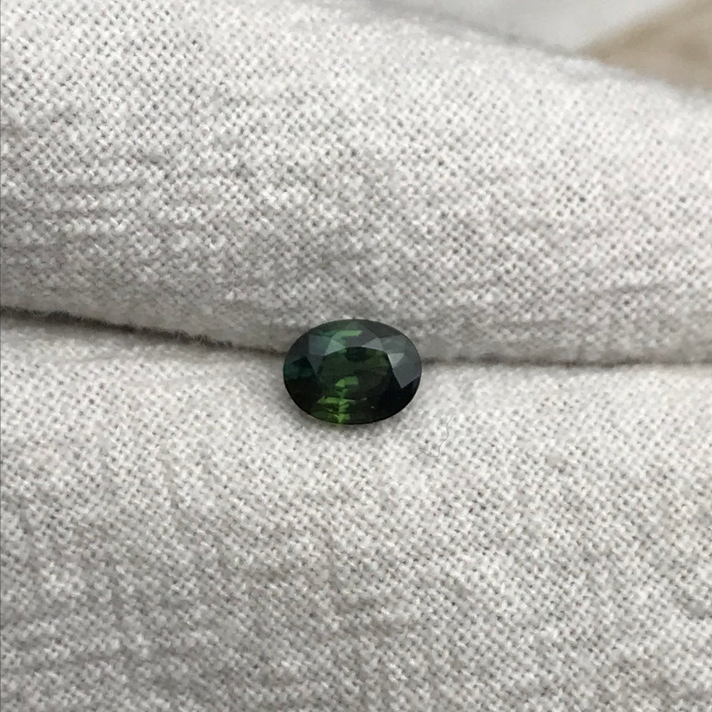 0.67 carat Natural Green Sapphire Oval Approx. 5x4.5mm