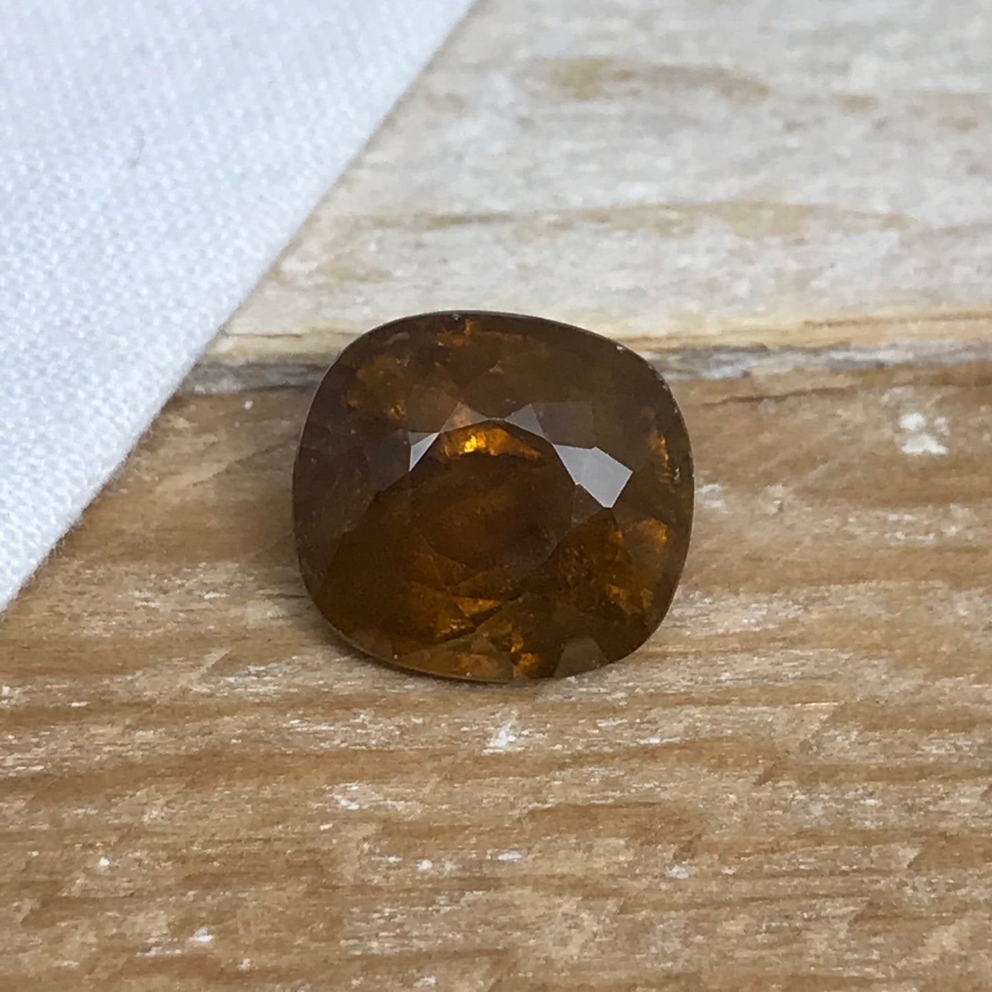 Brownish Yellow Sphene 6.79 Carat 11.7x10.7mm Oval Cut Loose Gemstone