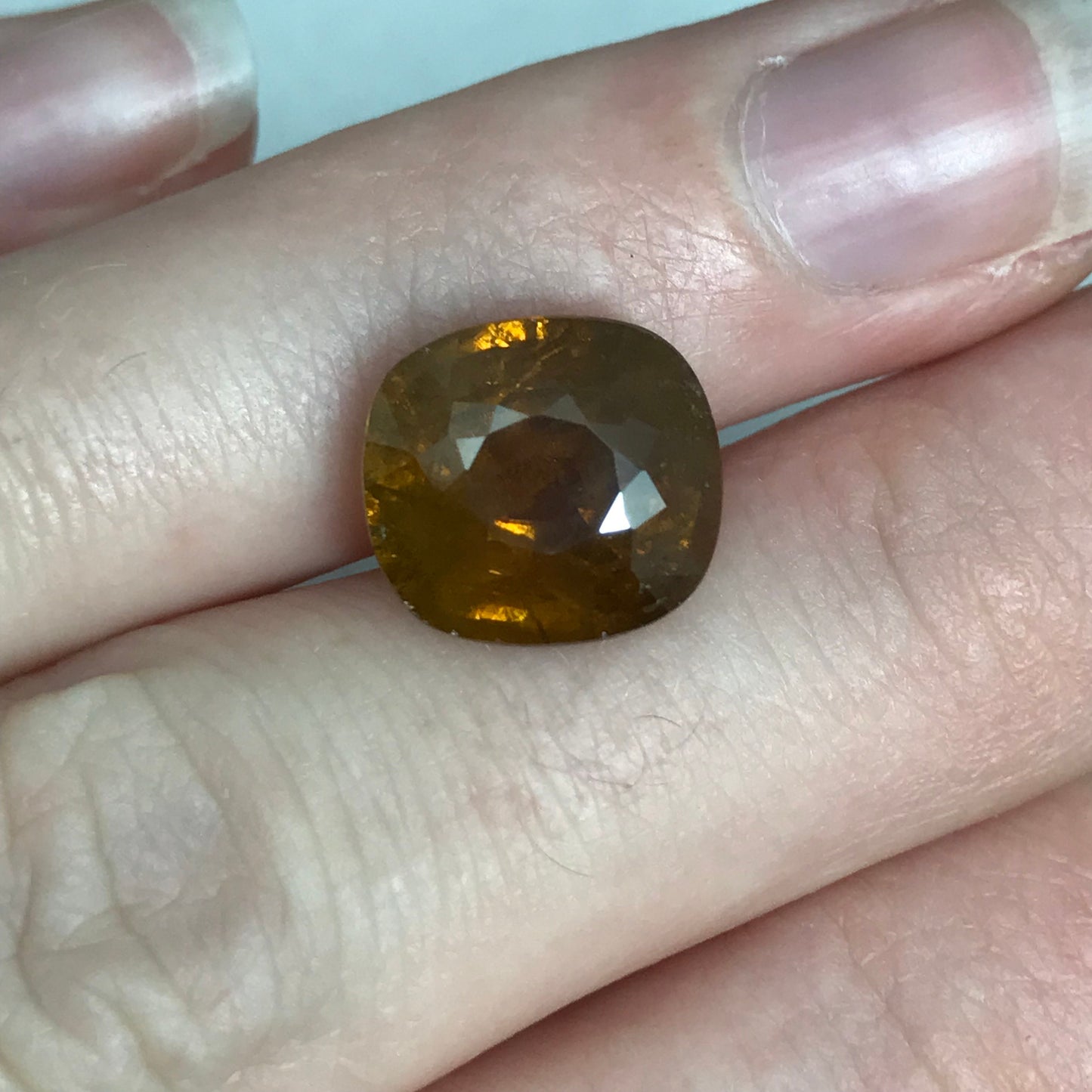 Brownish Yellow Sphene 6.79 Carat 11.7x10.7mm Oval Cut Loose Gemstone