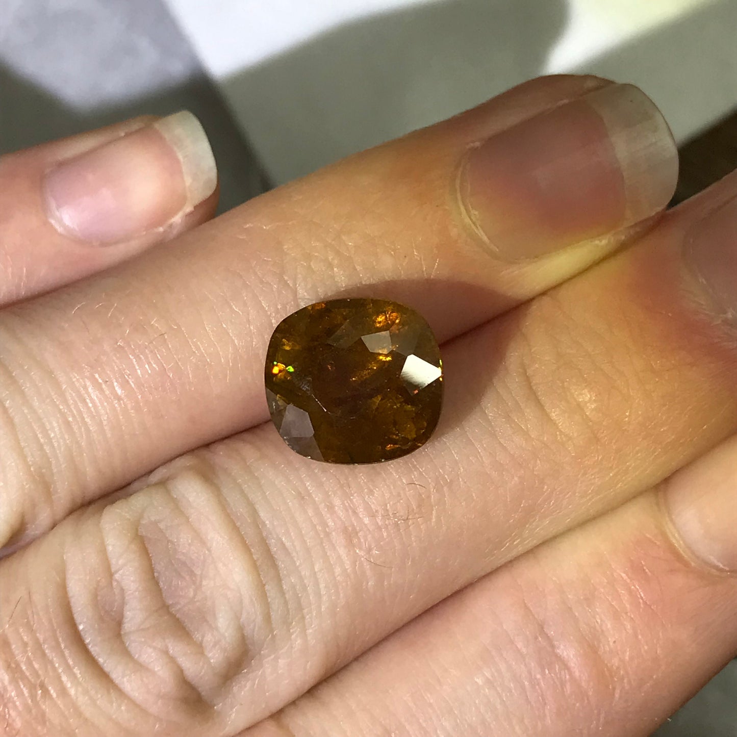 Brownish Yellow Sphene 6.79 Carat 11.7x10.7mm Oval Cut Loose Gemstone