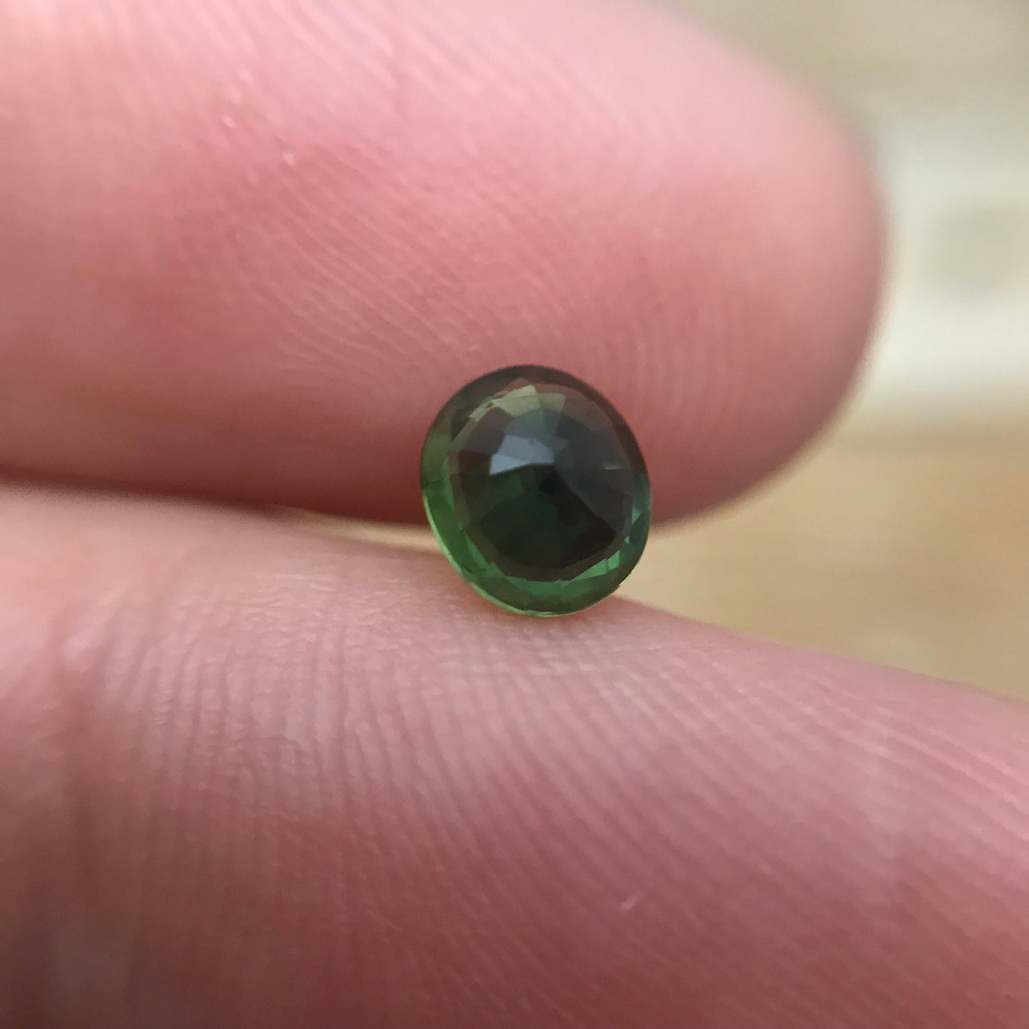 0.87 carat Natural Green Sapphire 5.8x5.1 Oval, Approx. 6x5mm