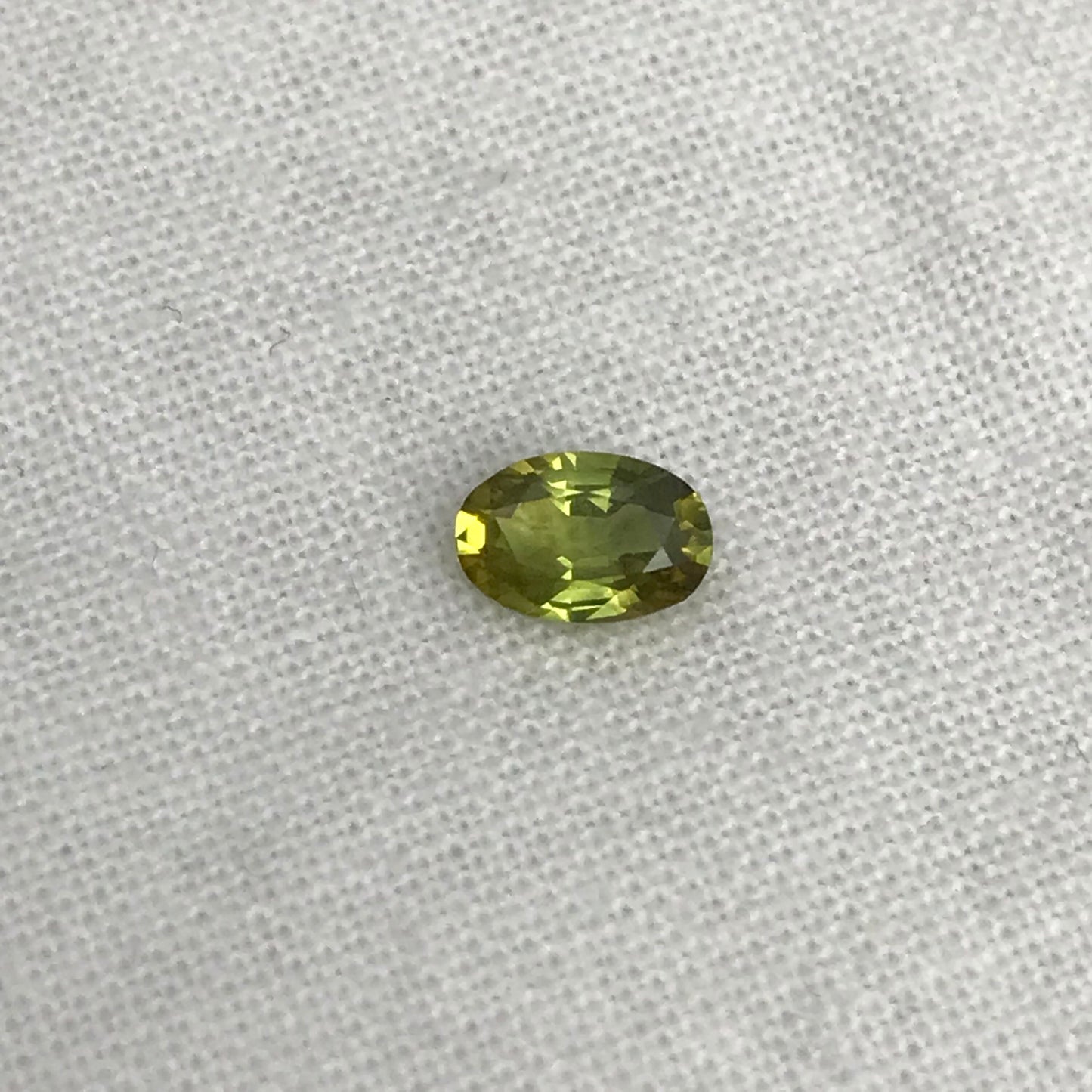 Greenish Yellow Sapphire 6x4mm, Color-Treated Yellow Green 0.53  Ct, Oval cut, BE Treated Natural Sapphire