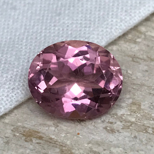 4.22 Carat Natural Pink Tourmaline 11.3x9.4mm Oval Cut, Faceted Loose Gemstone, scratched