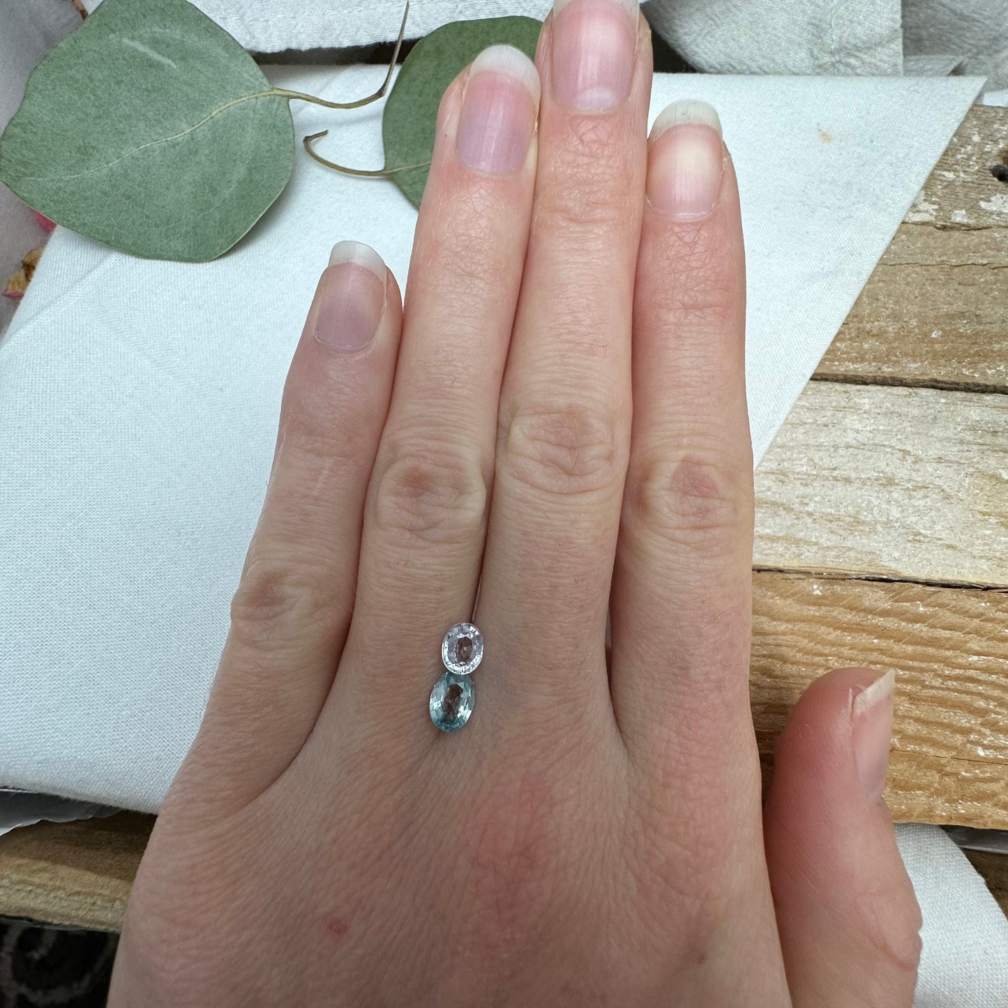 Natural Light Sapphire and Blue Zircon Parcel, 6.8x5mm Oval cut Zircon and 5.8x5mm Sapphire