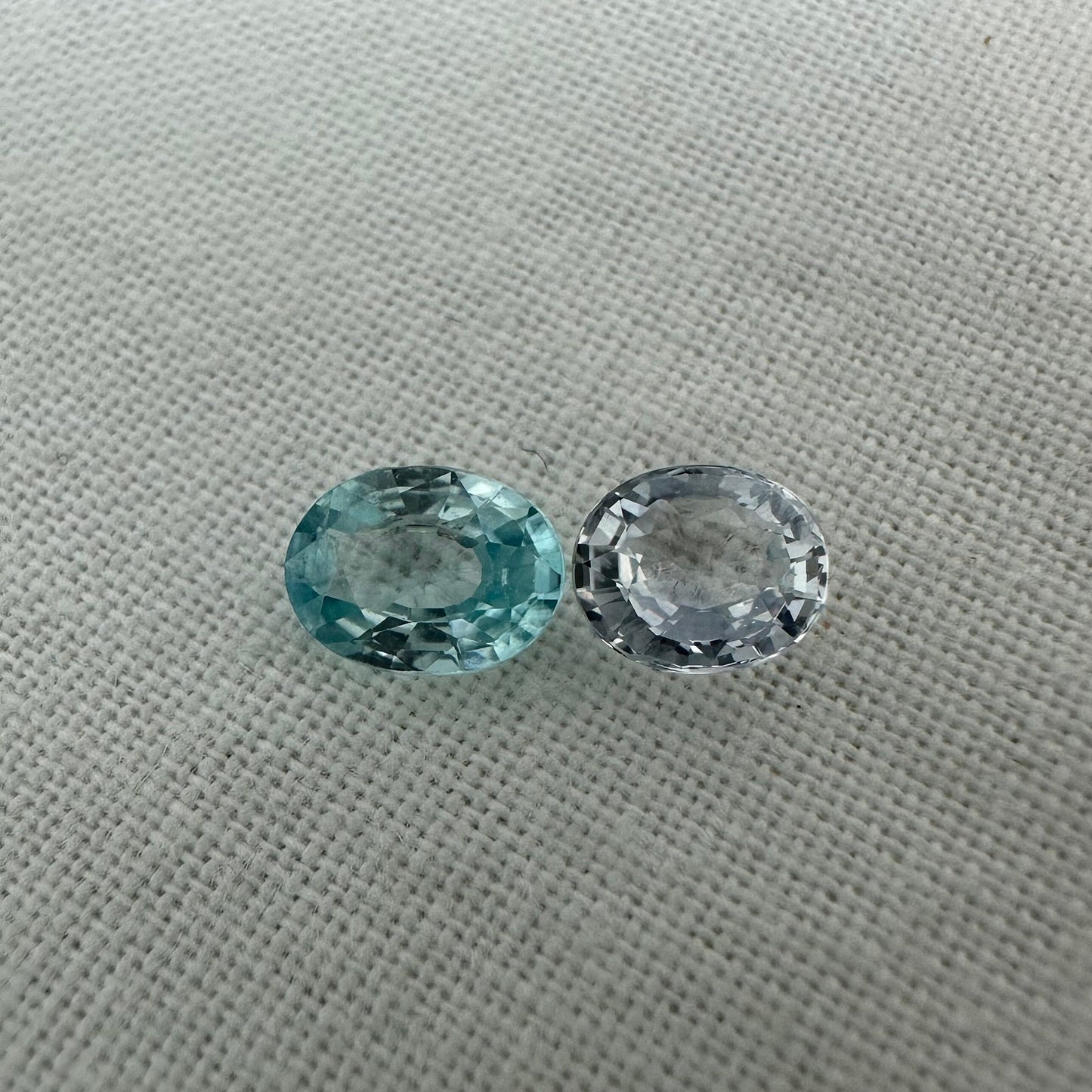 Natural Light Sapphire and Blue Zircon Parcel, 6.8x5mm Oval cut Zircon and 5.8x5mm Sapphire