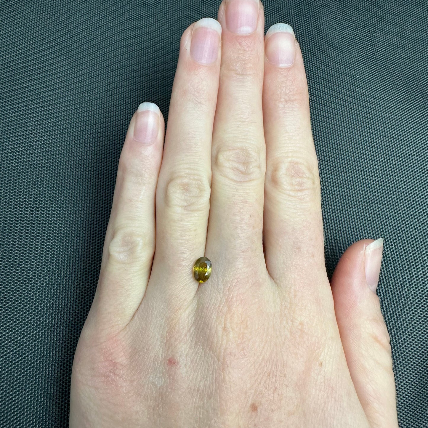 7x5mm Yellow Sphene Oval Cut, 0.92 Carat Natural Orangish Yellow Sphene with Rainbow Flashes