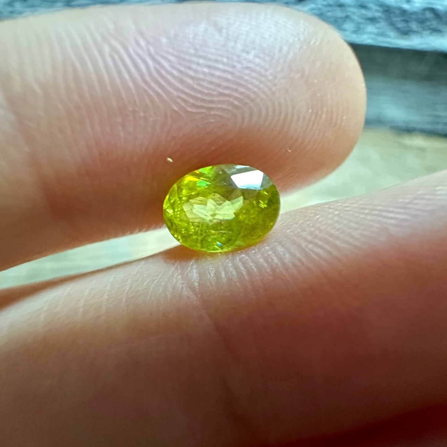 Yellow Sphene Oval Cut, 1.12 Carat Natural Light Yellow Sphene with Rainbow Flashes