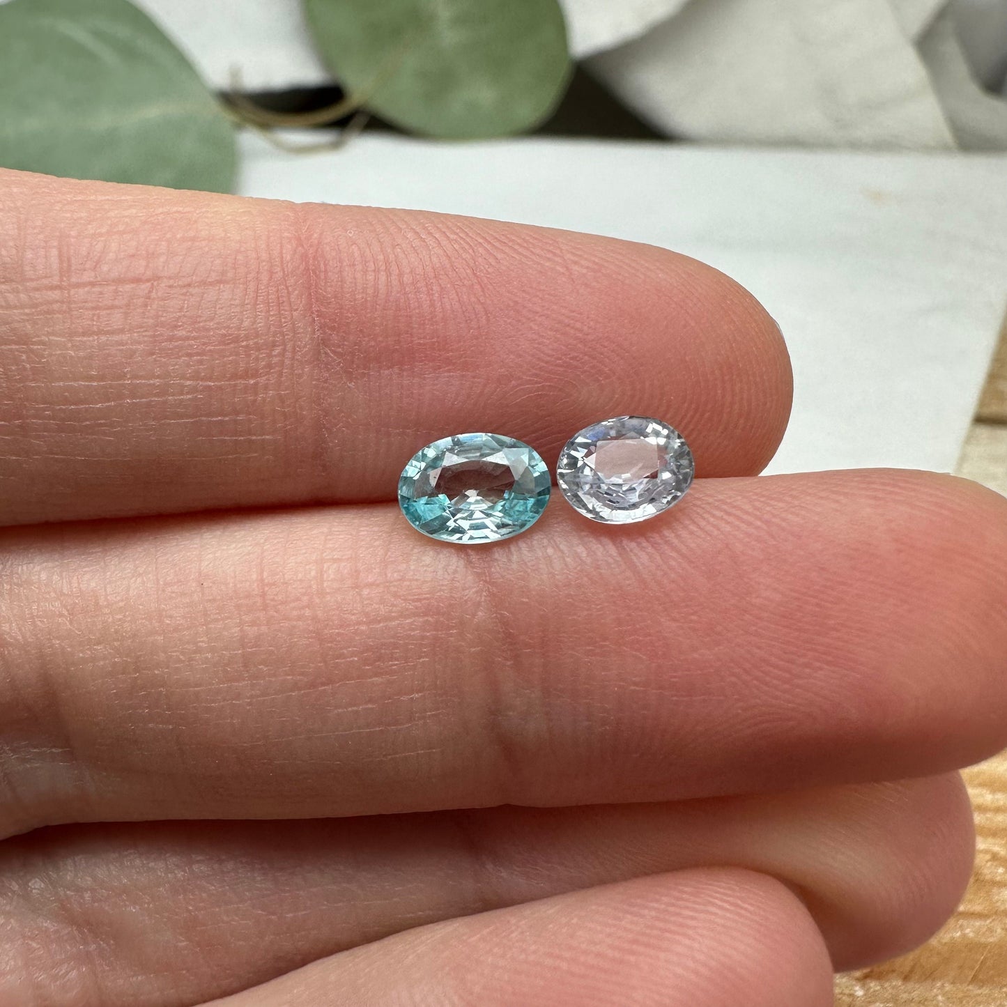 Natural Light Sapphire and Blue Zircon Parcel, 6.8x5mm Oval cut Zircon and 5.8x5mm Sapphire